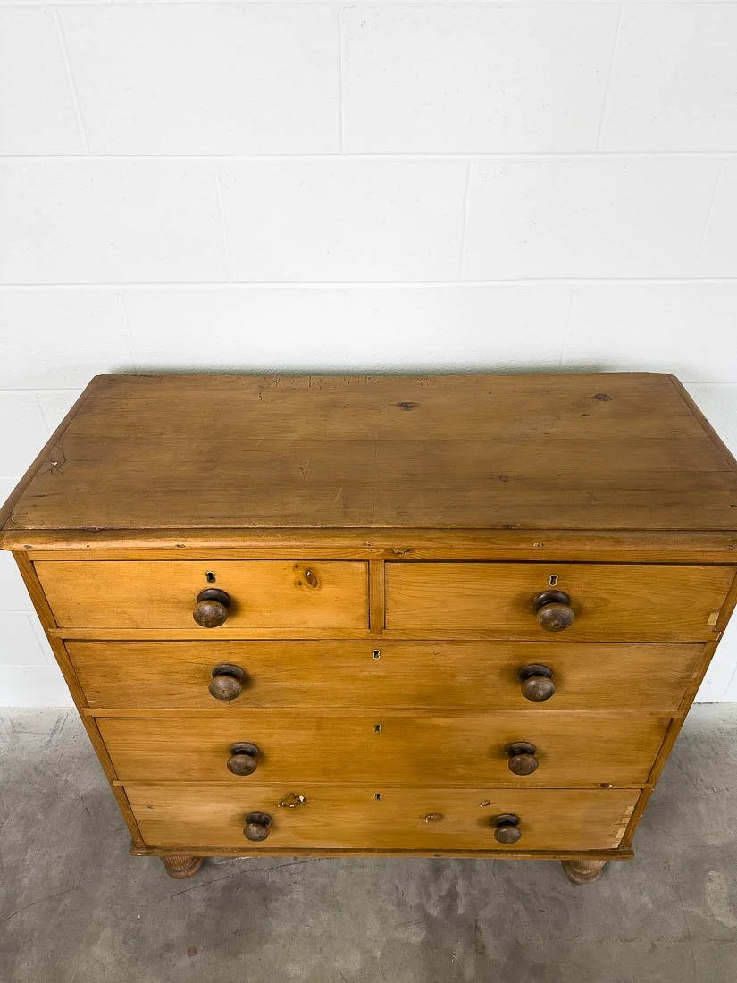 Antique pine drawers in a mid-brown color