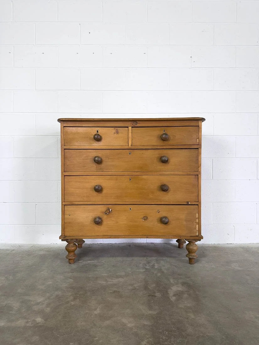 Antique pine drawers in a mid-brown color