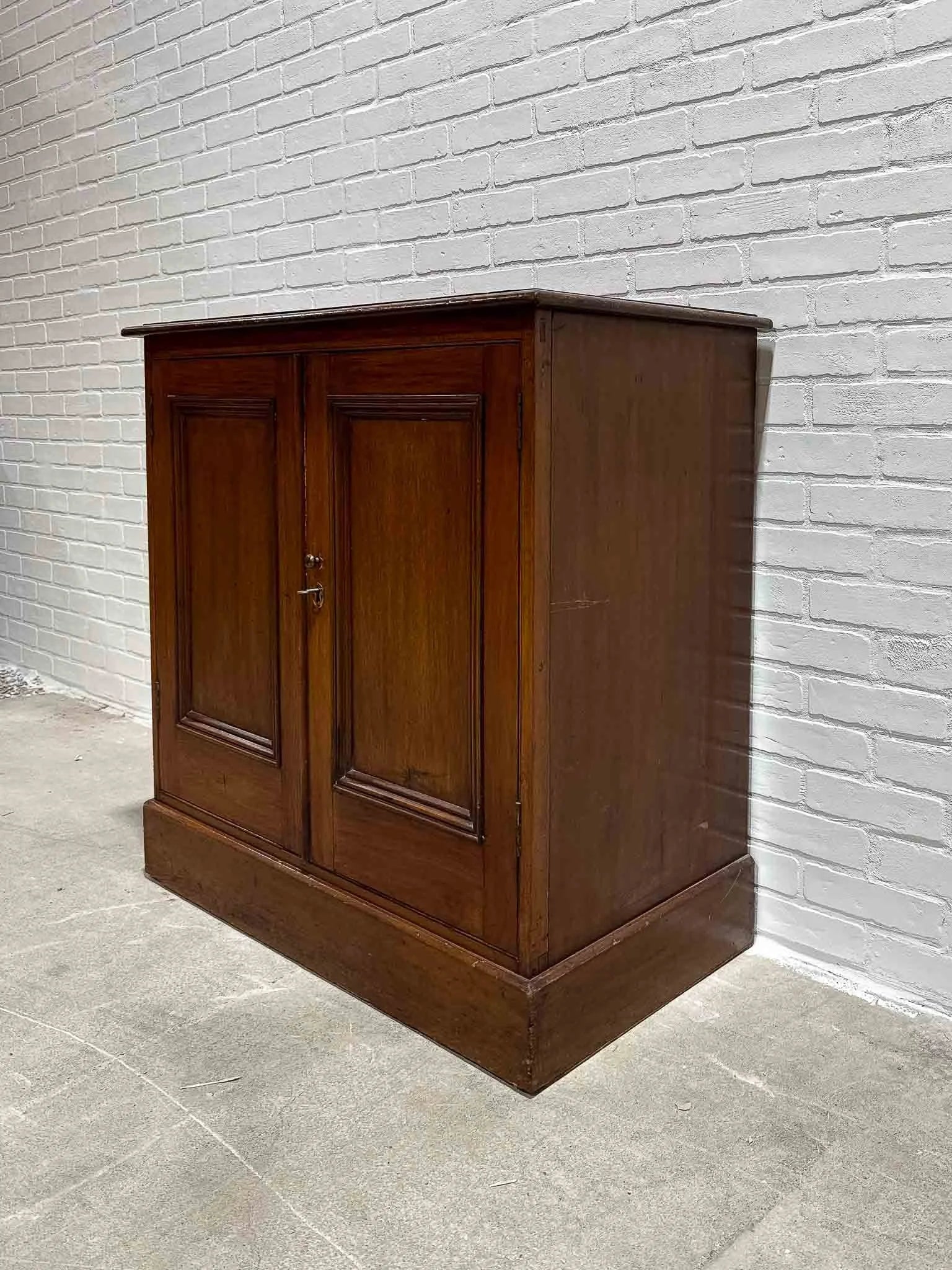 Dark English antique cupboard