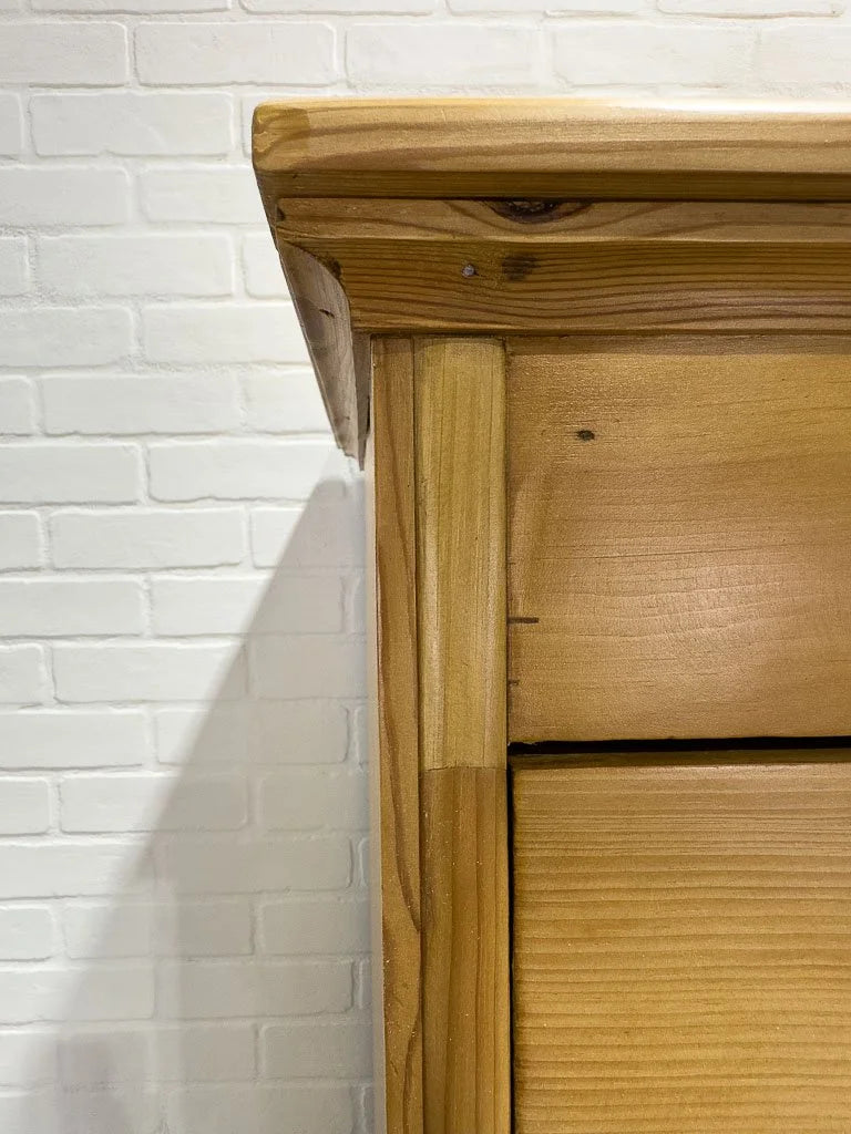 Tall antique pine chest of drawers