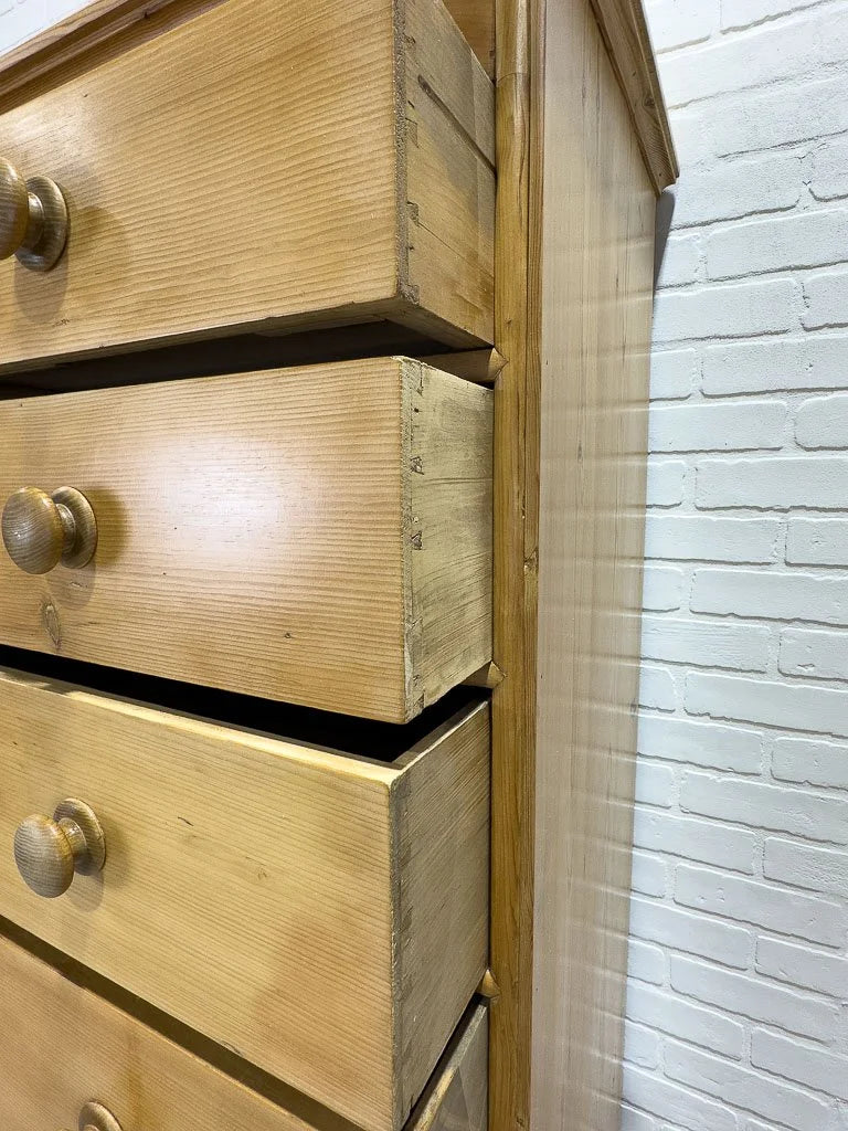 Tall antique pine chest of drawers