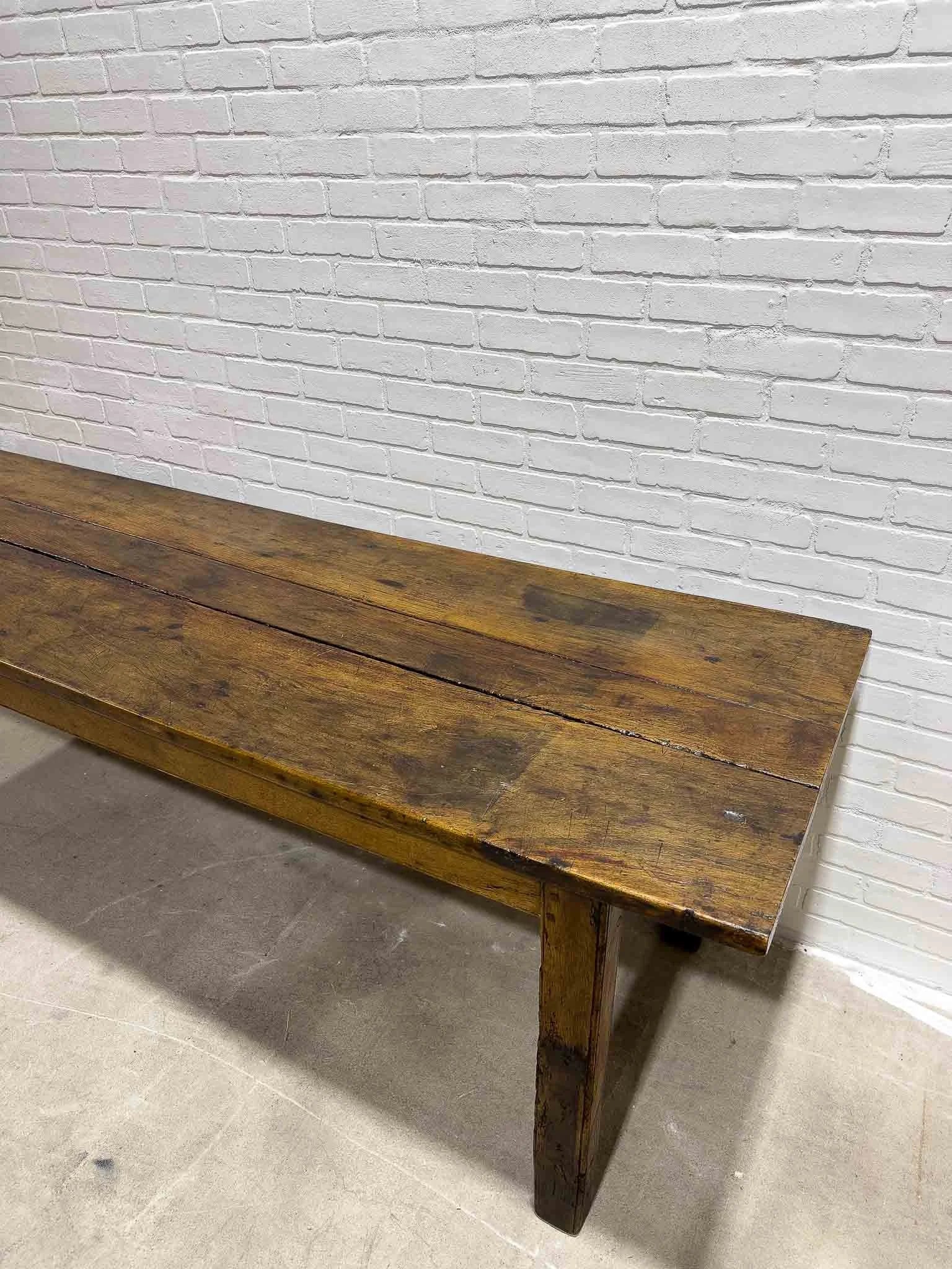Wonderful eight foot French table with a drawer