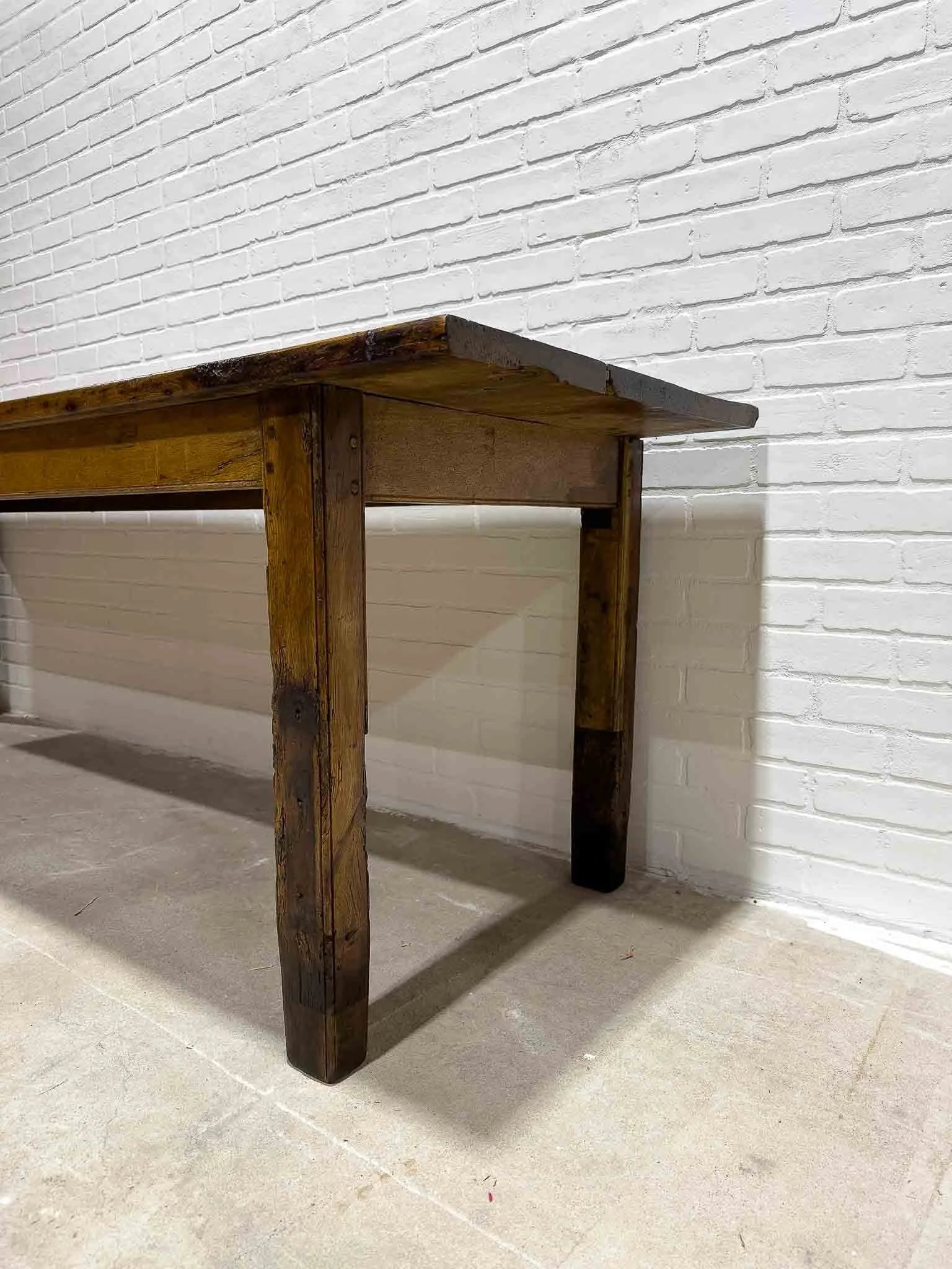Wonderful eight foot French table with a drawer