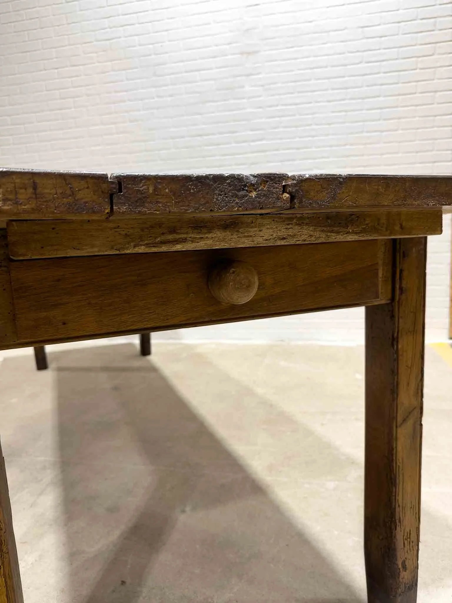 Wonderful eight foot French table with a drawer
