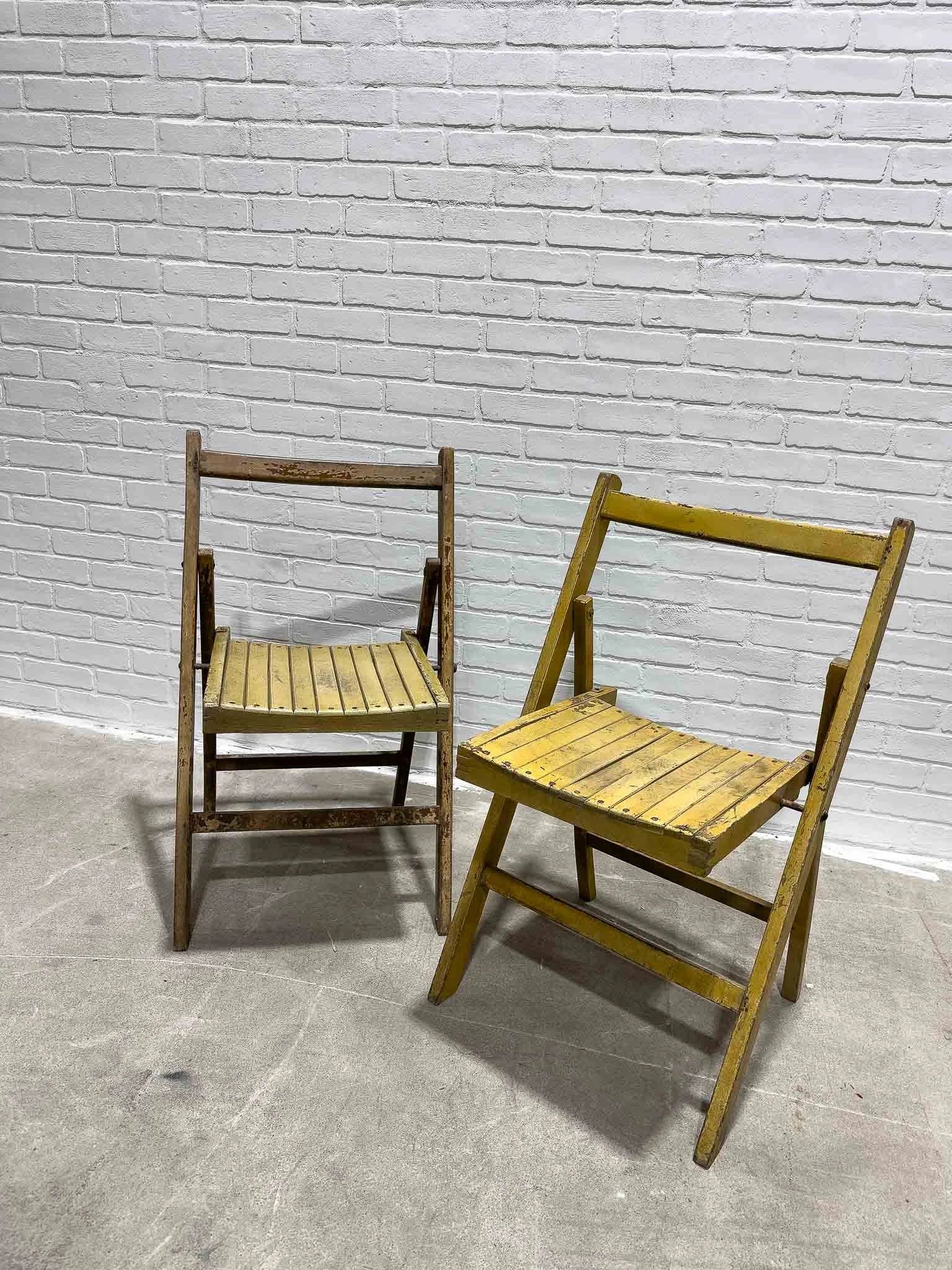 Pair of vintage yellow folding chairs