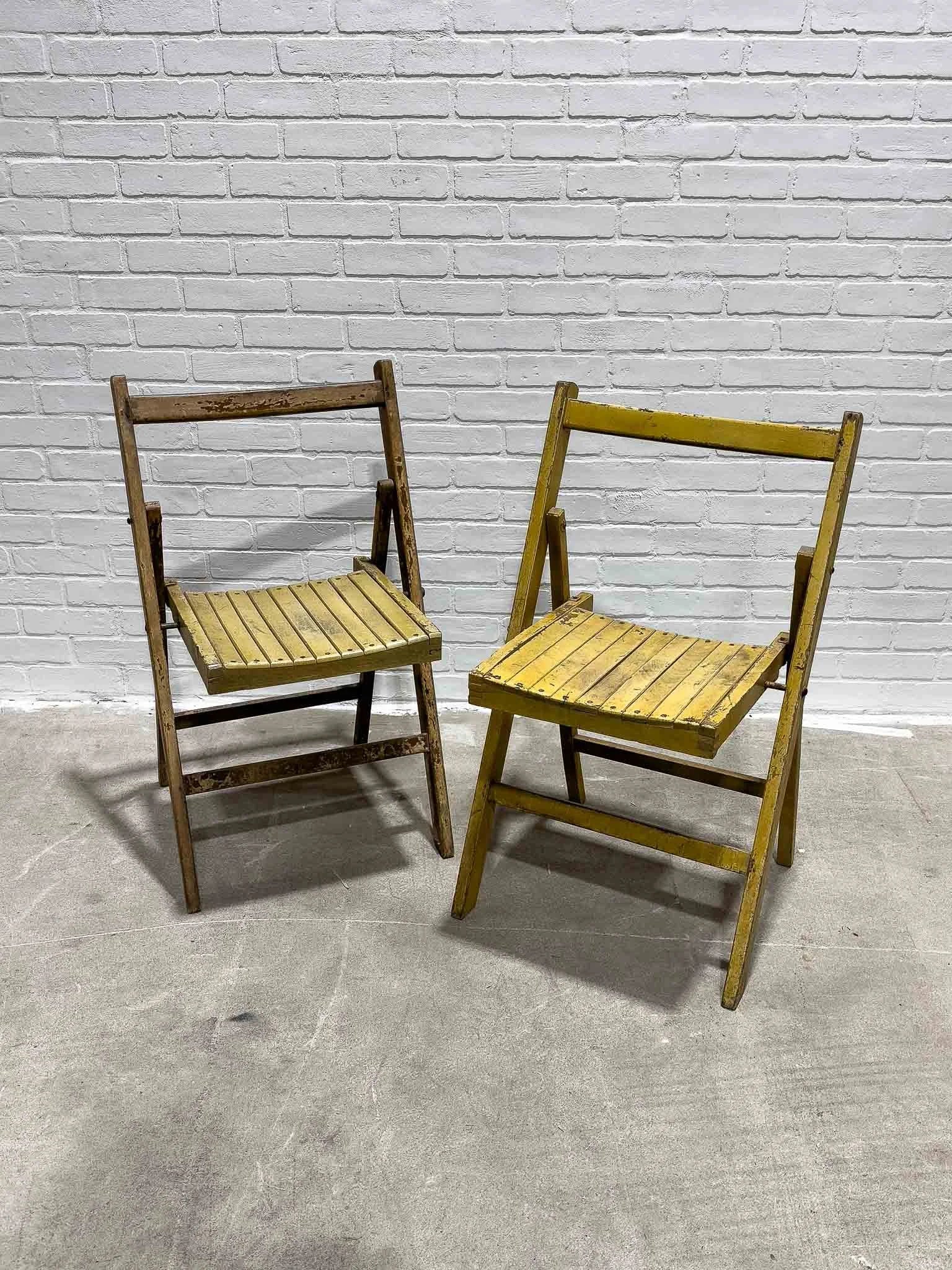 Pair of vintage yellow folding chairs