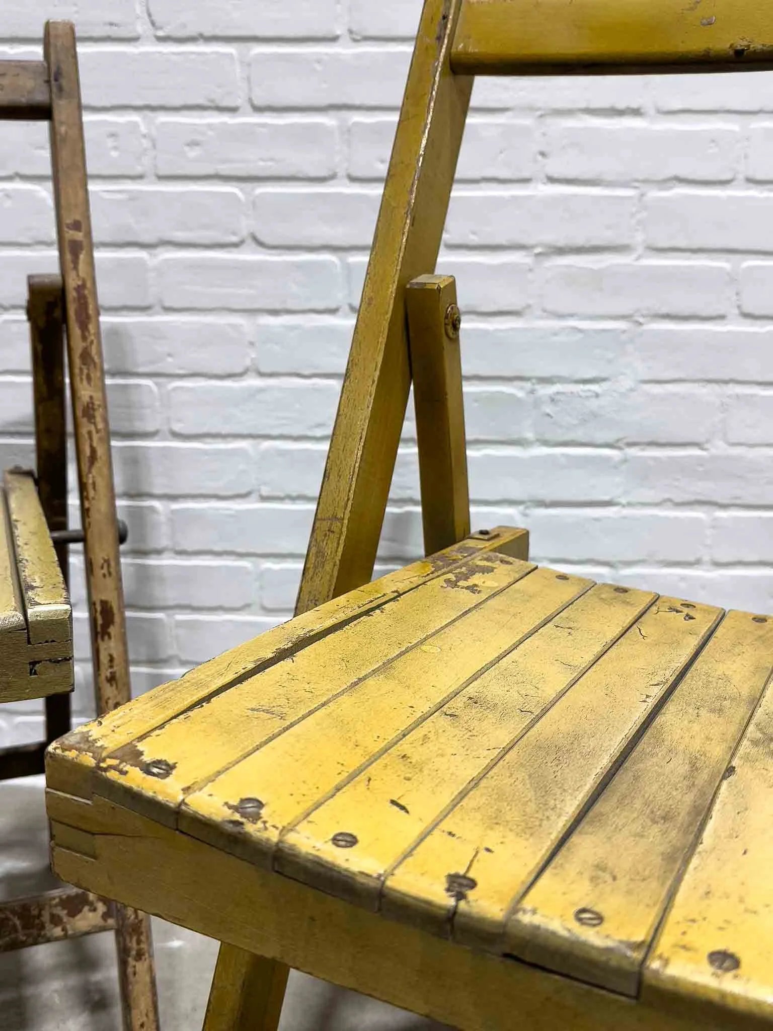 Pair of vintage yellow folding chairs