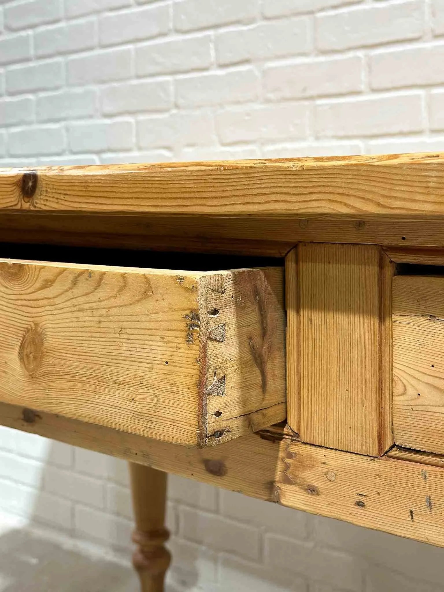 Antique English dining table with two drawers