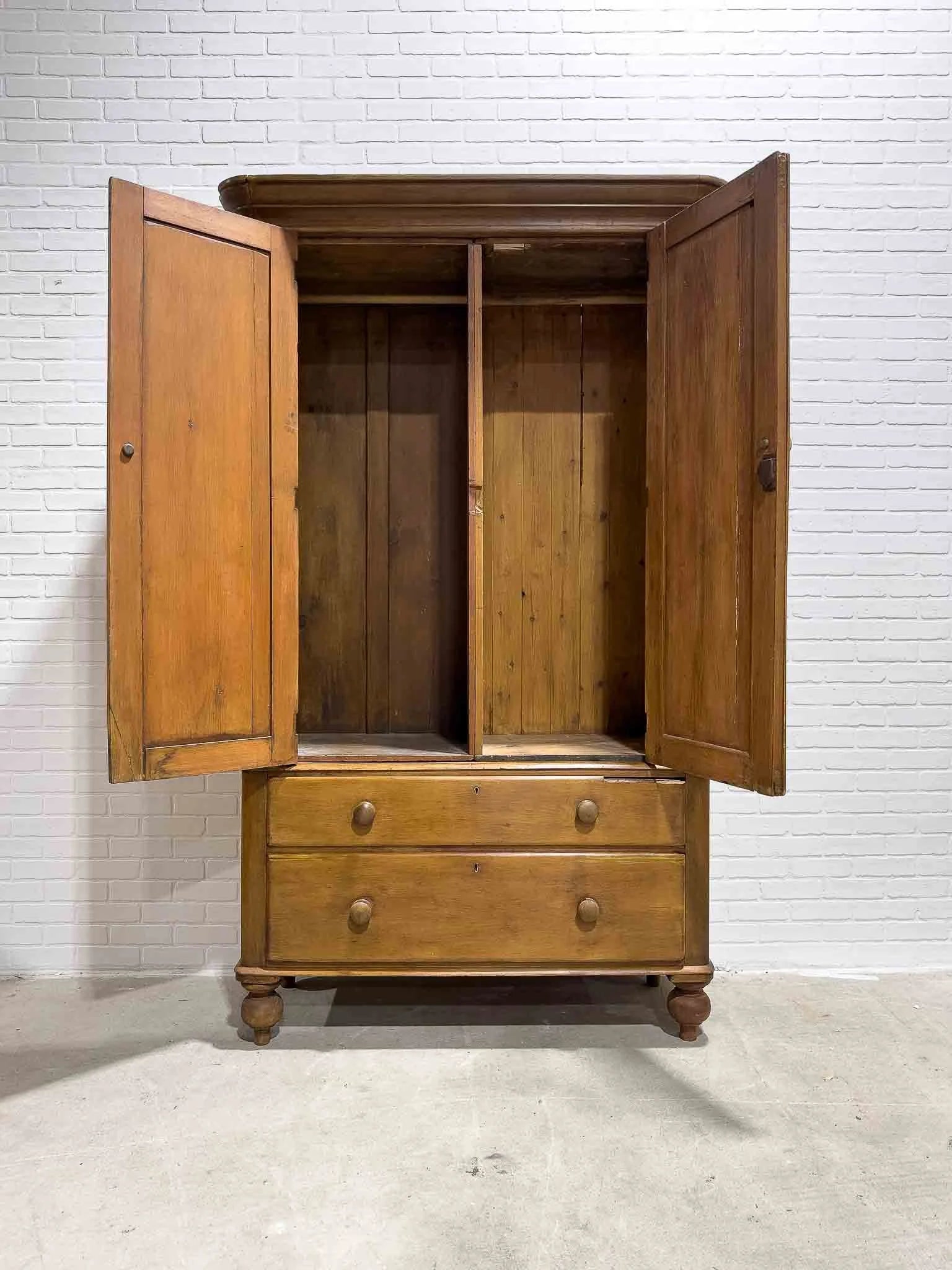 Antique pine wardrobe on tulip feet