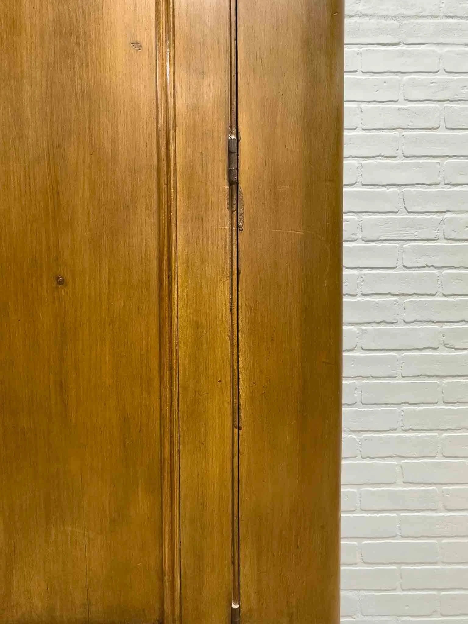 Antique pine wardrobe on tulip feet