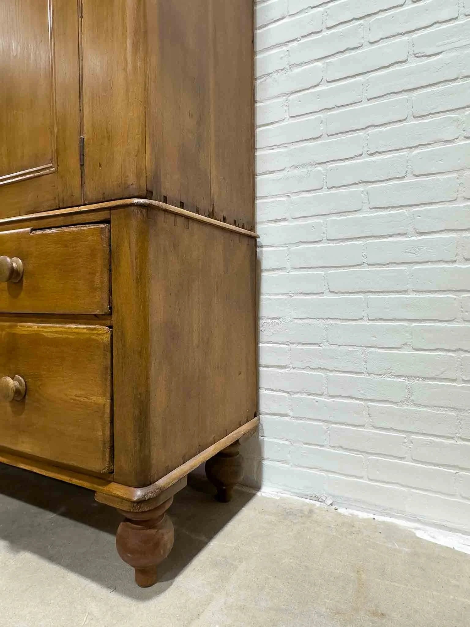 Antique pine wardrobe on tulip feet