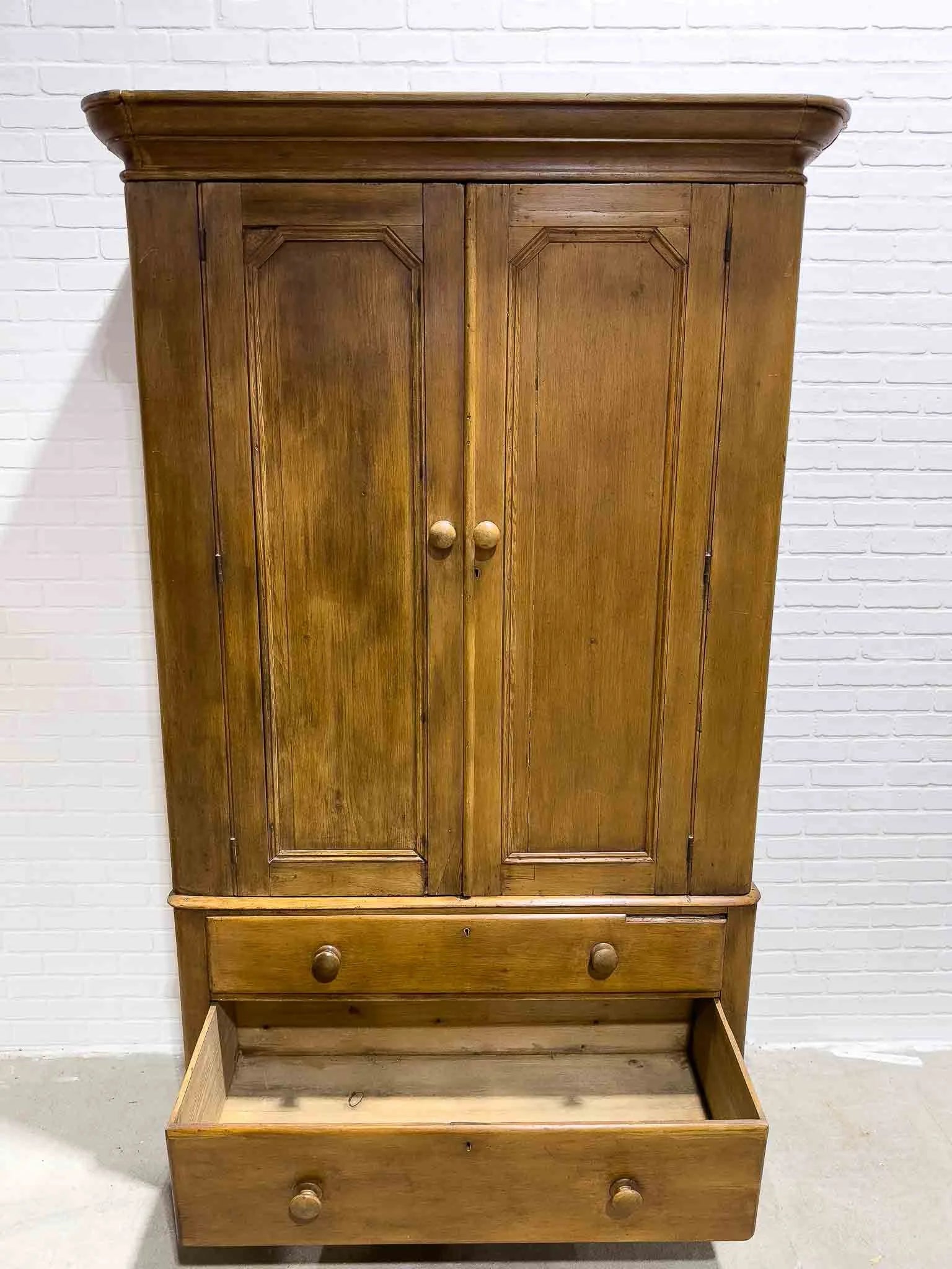 Antique pine wardrobe on tulip feet