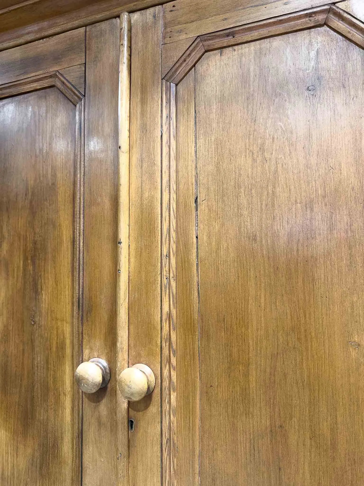Antique pine wardrobe on tulip feet