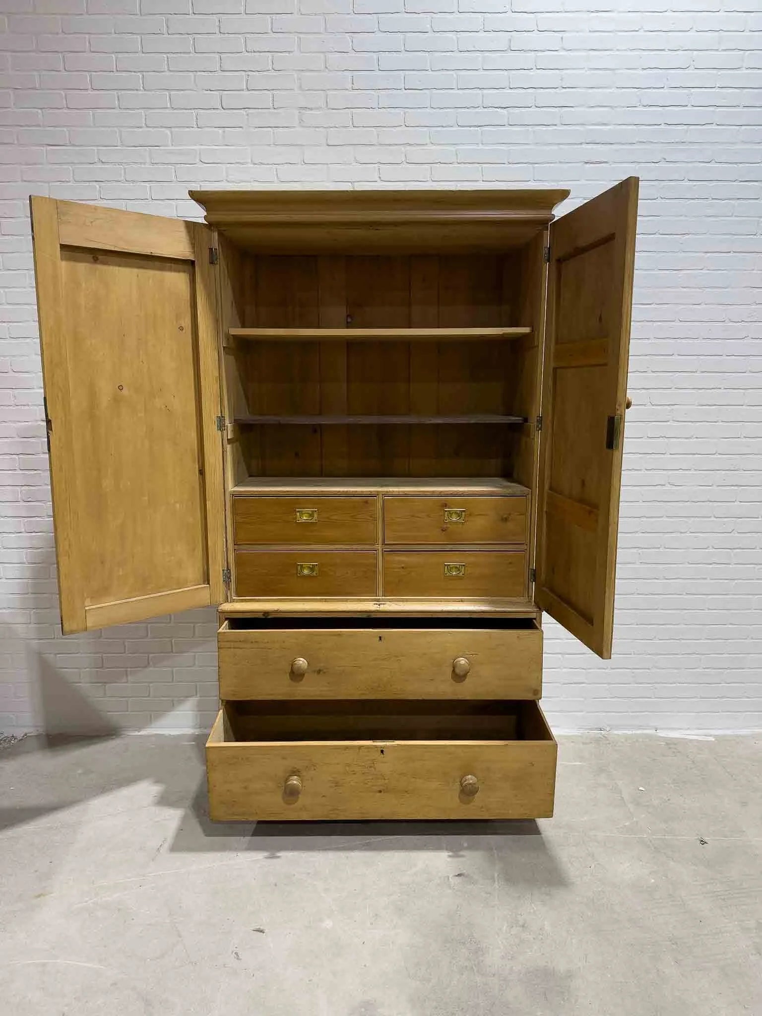 Antique English linen press with interior drawers