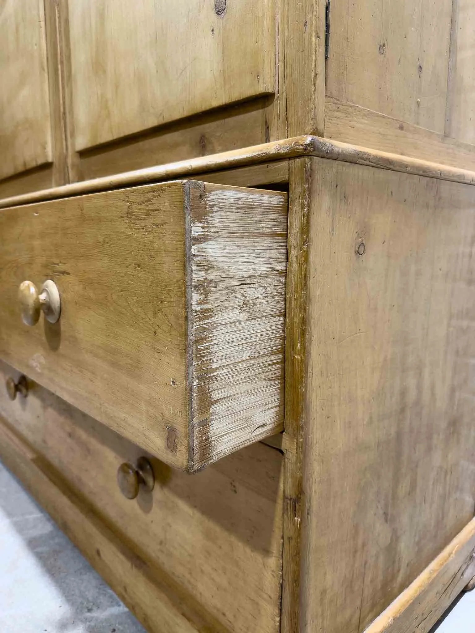 Antique English linen press with interior drawers