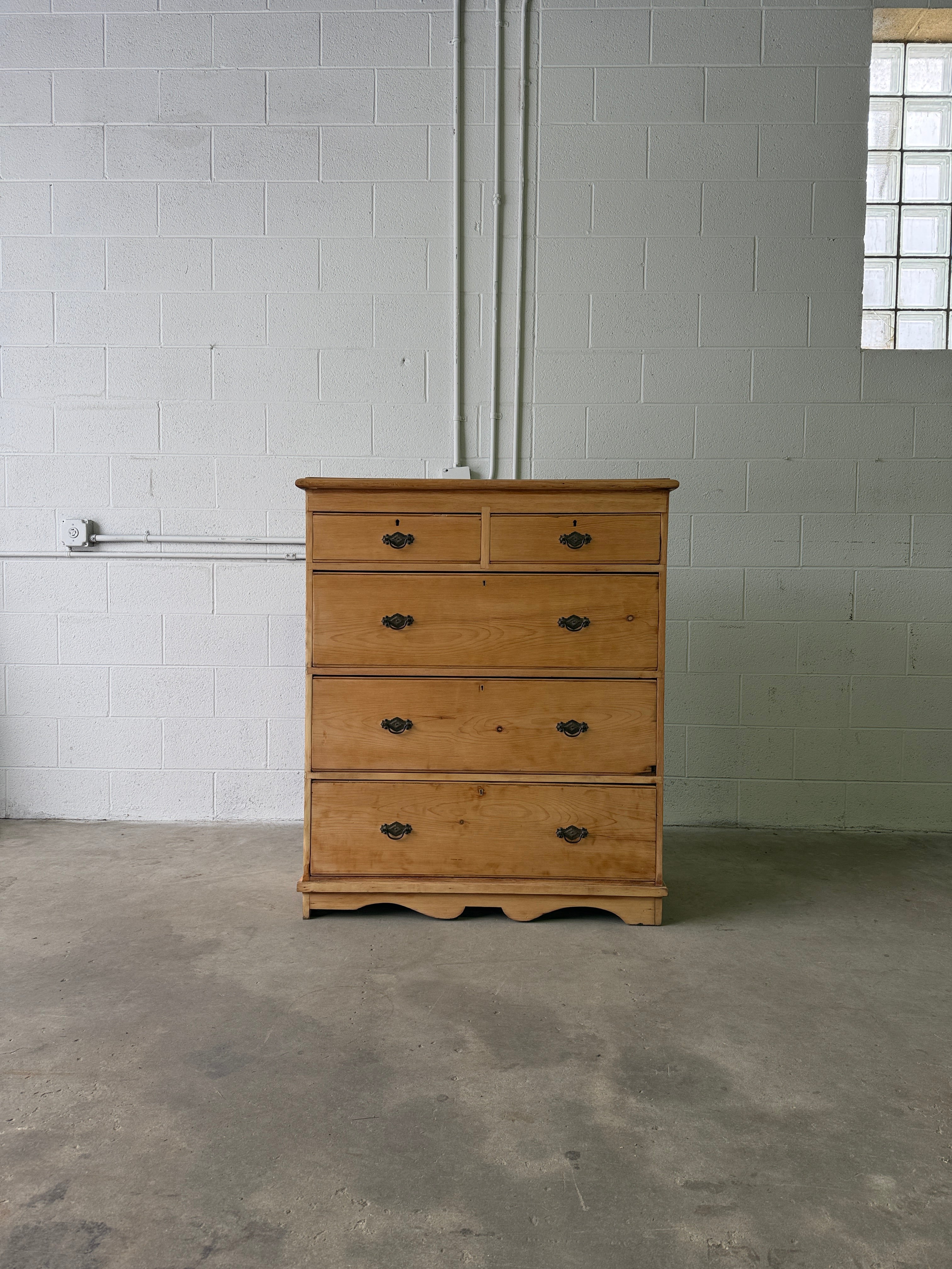 Tall set of antique pine drawers