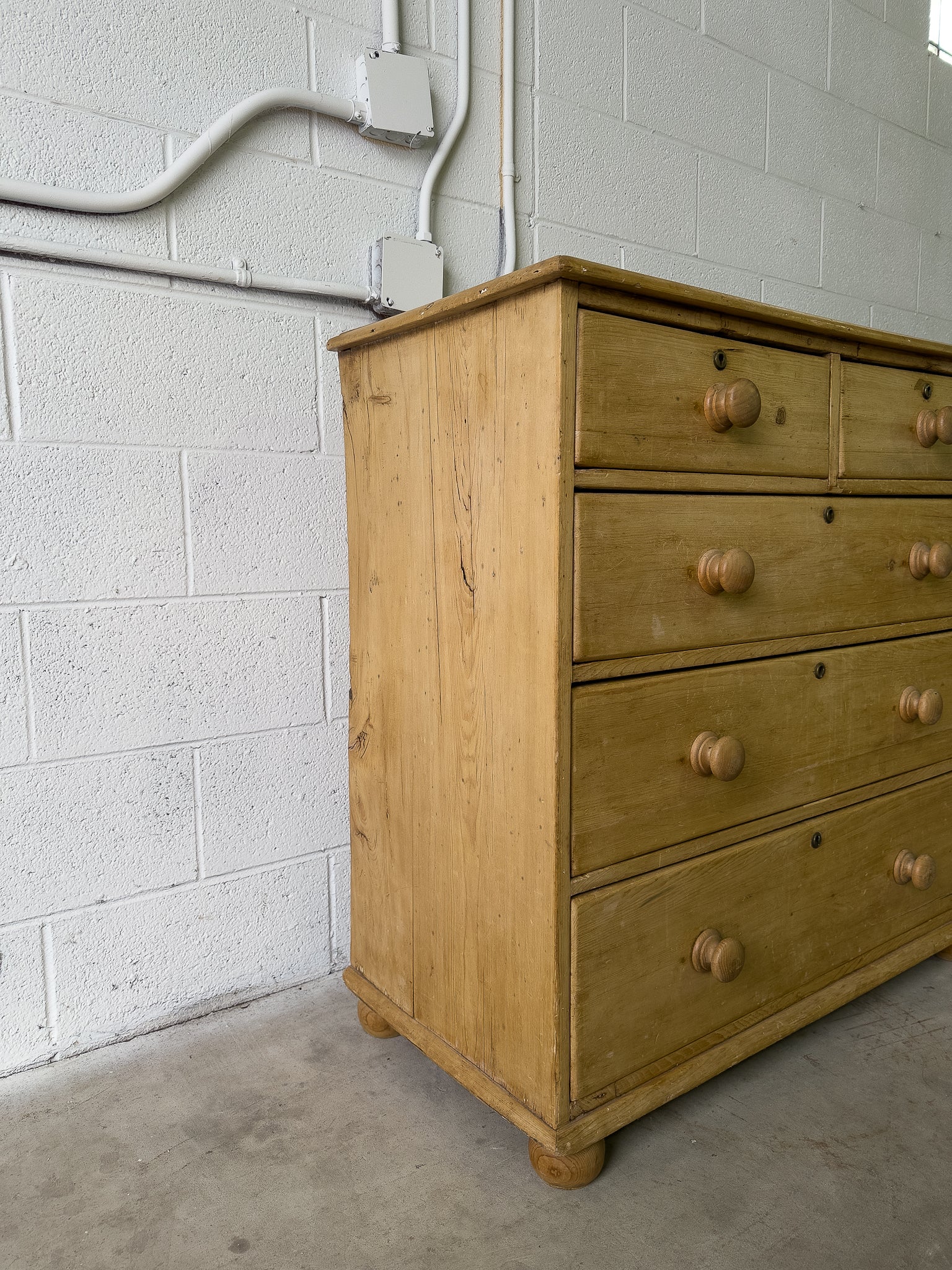 Light colored English antique pine drawers