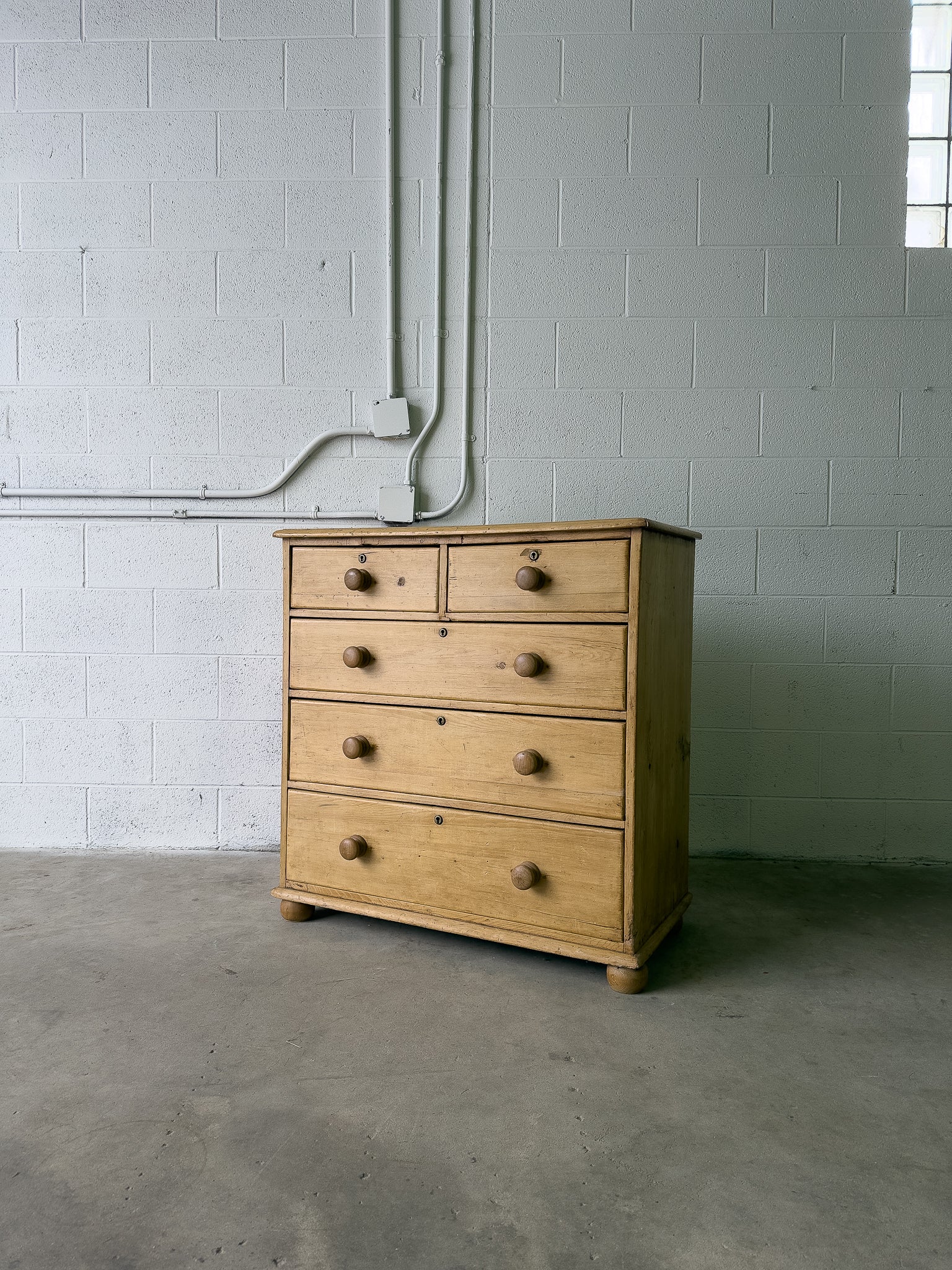 Light colored English antique pine drawers