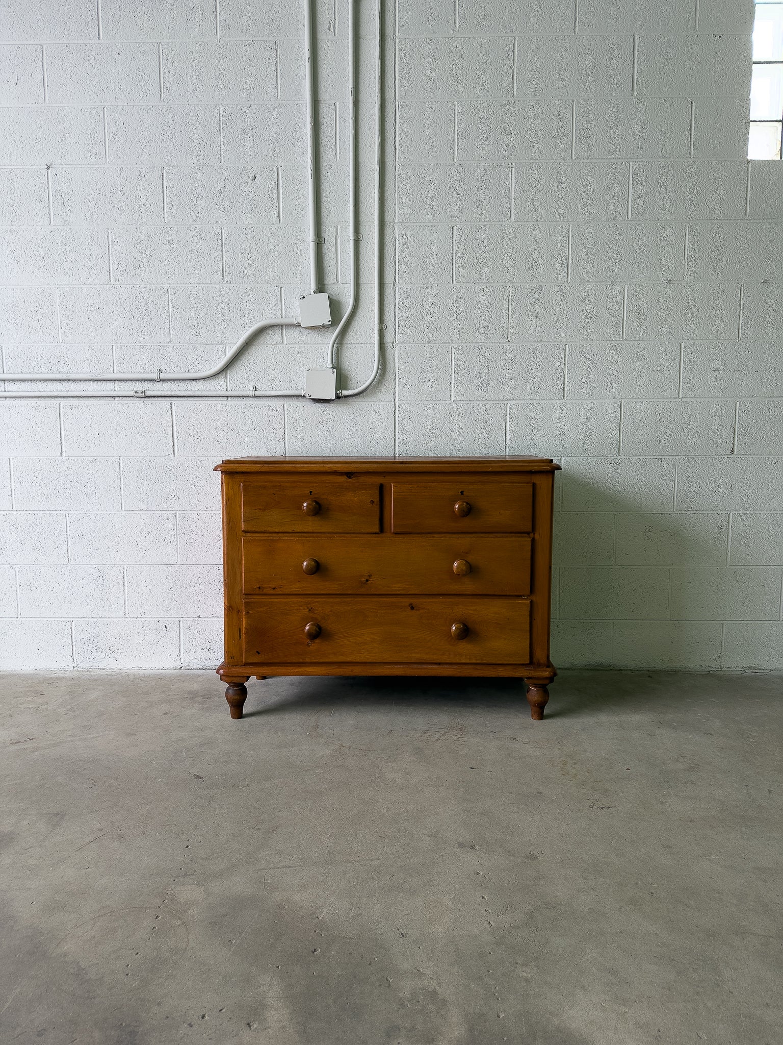 Antique pine chest of drawers on turned feet