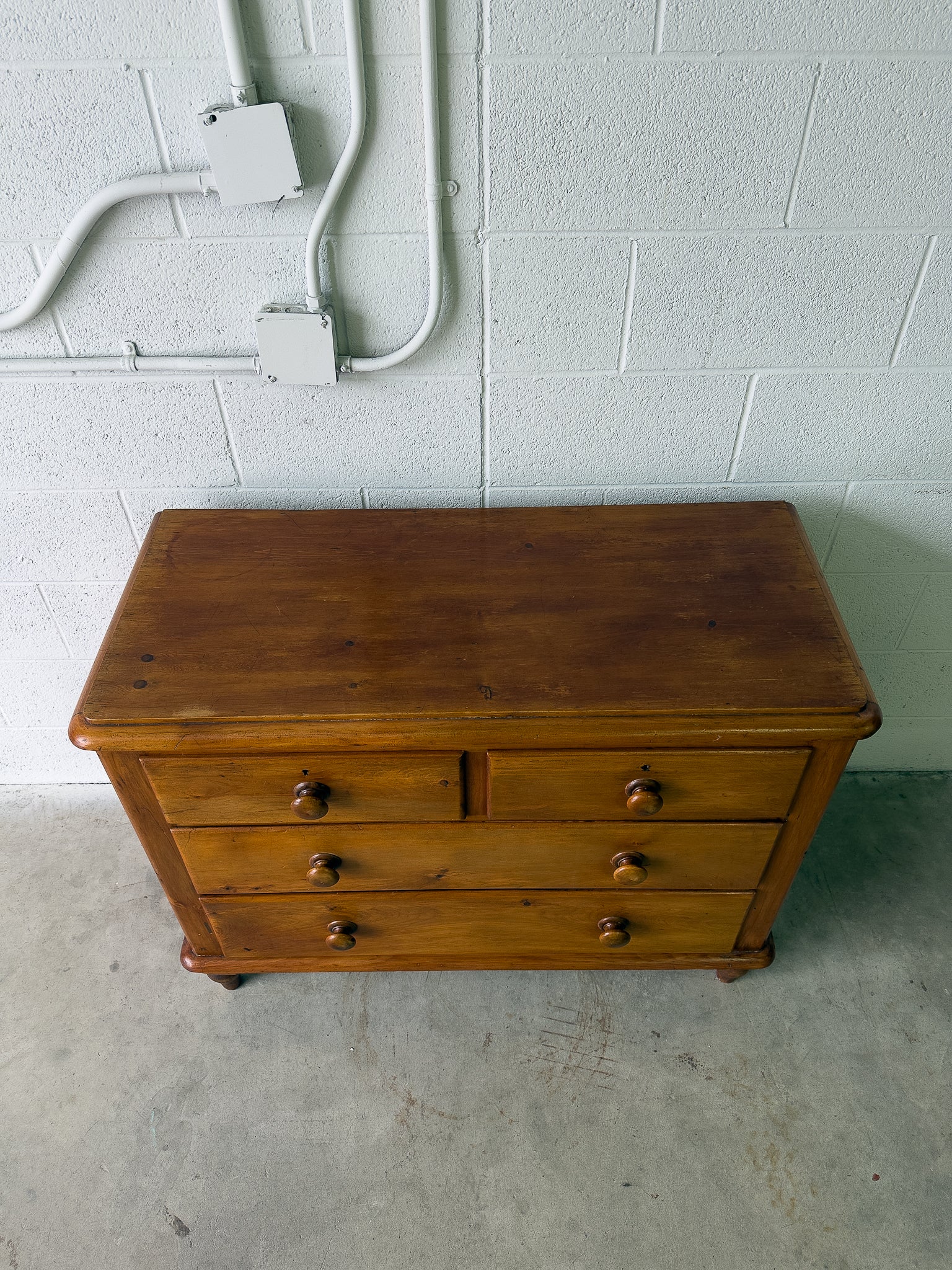 Antique pine chest of drawers on turned feet