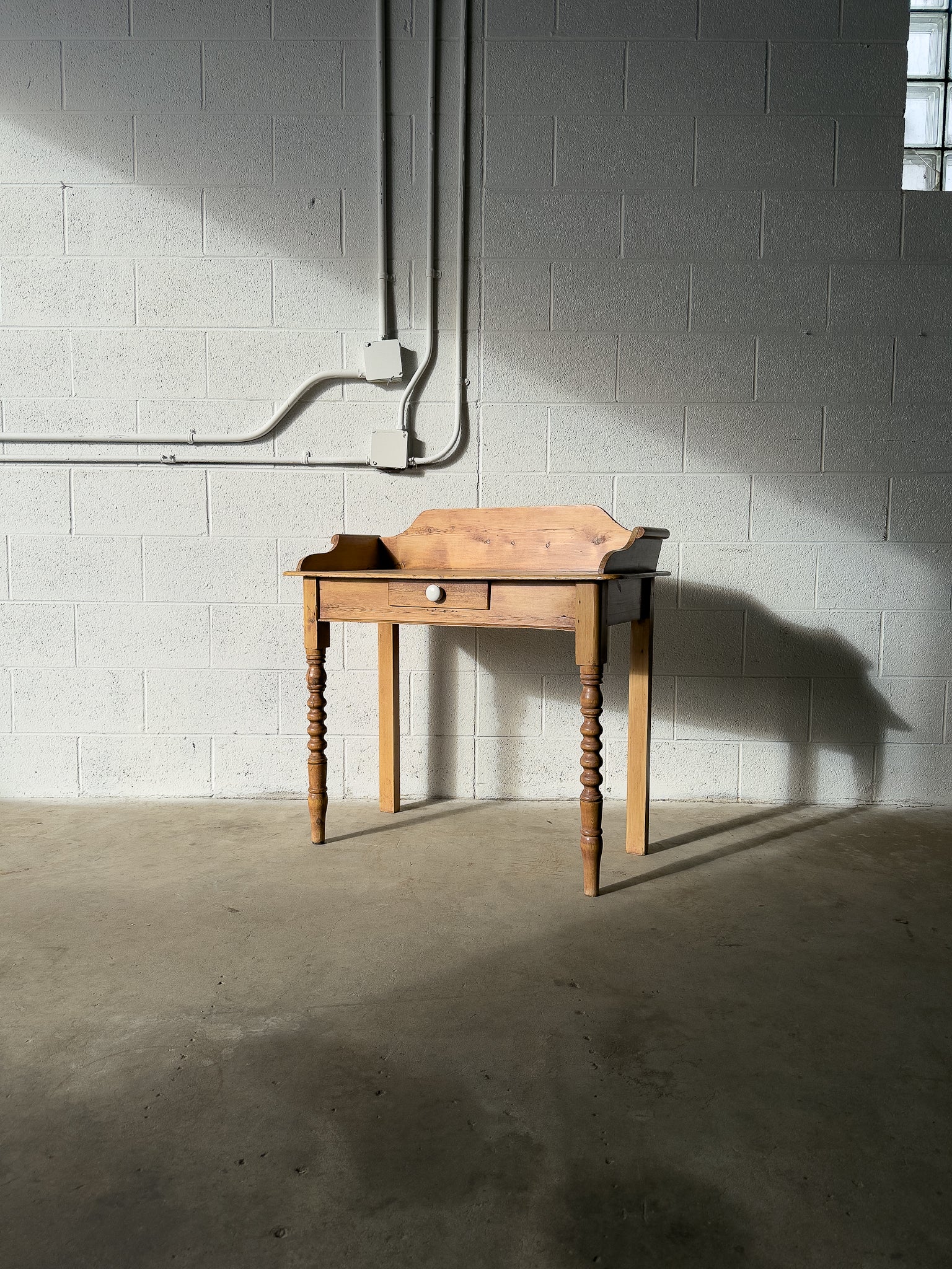 Antique pine washstand with turned legs