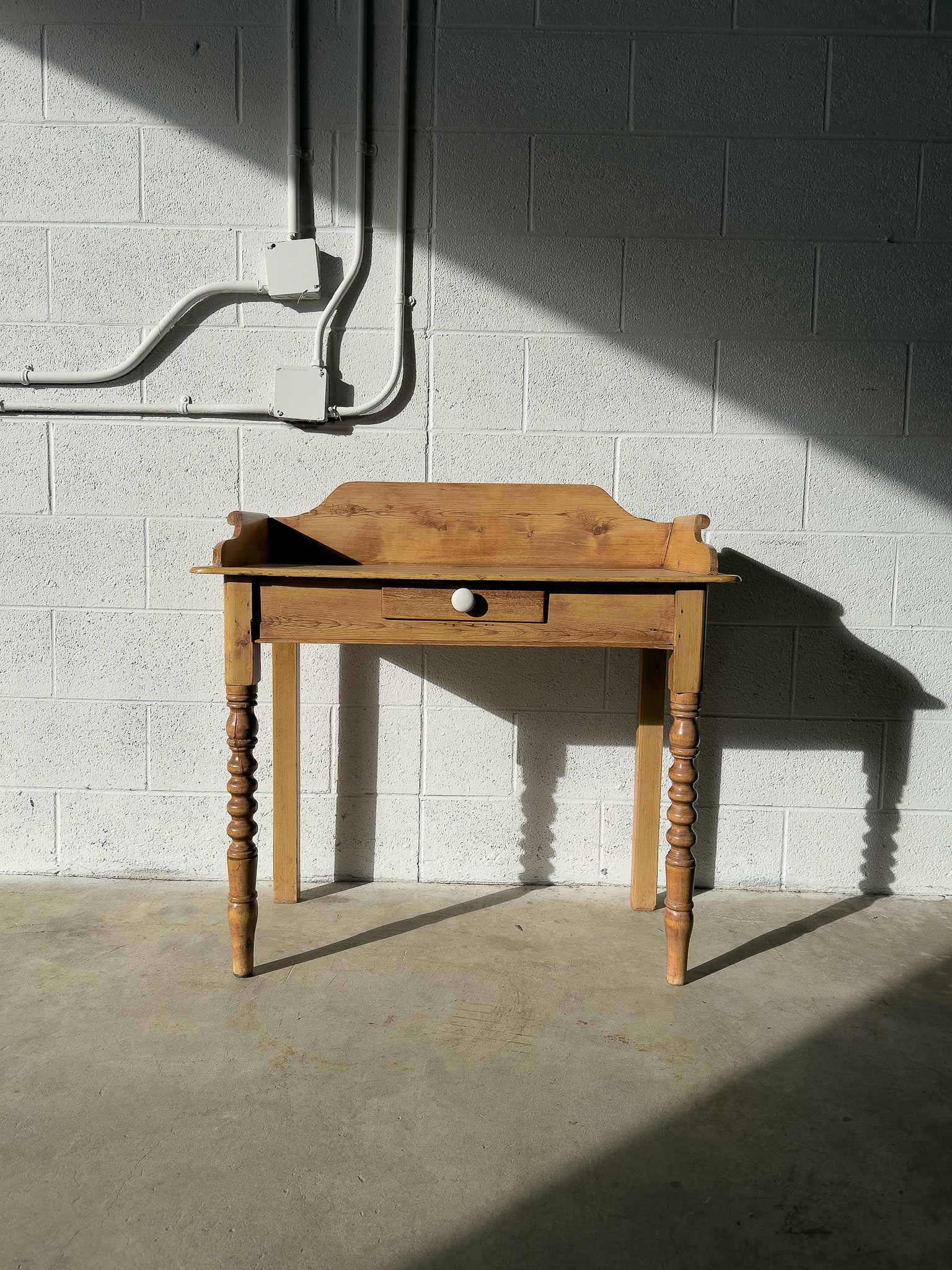 Antique pine washstand with turned legs
