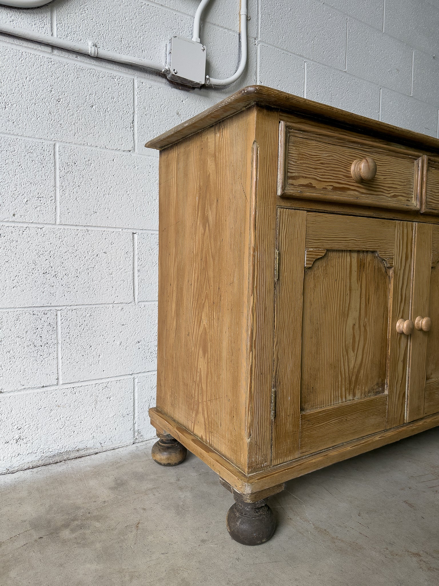 Petite antique pine sideboard with two doors
