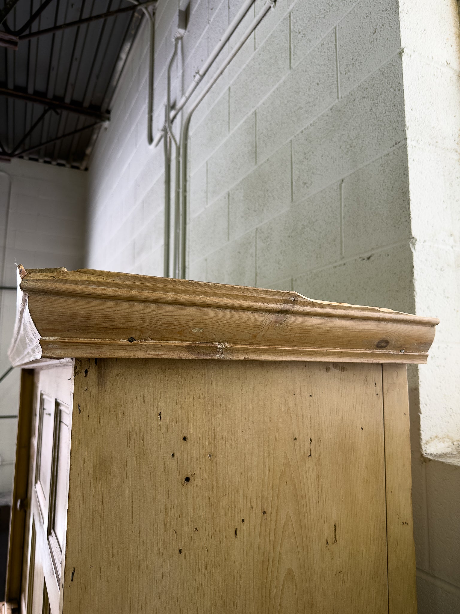 Large antique pine housekeepers cupboard with sliding doors