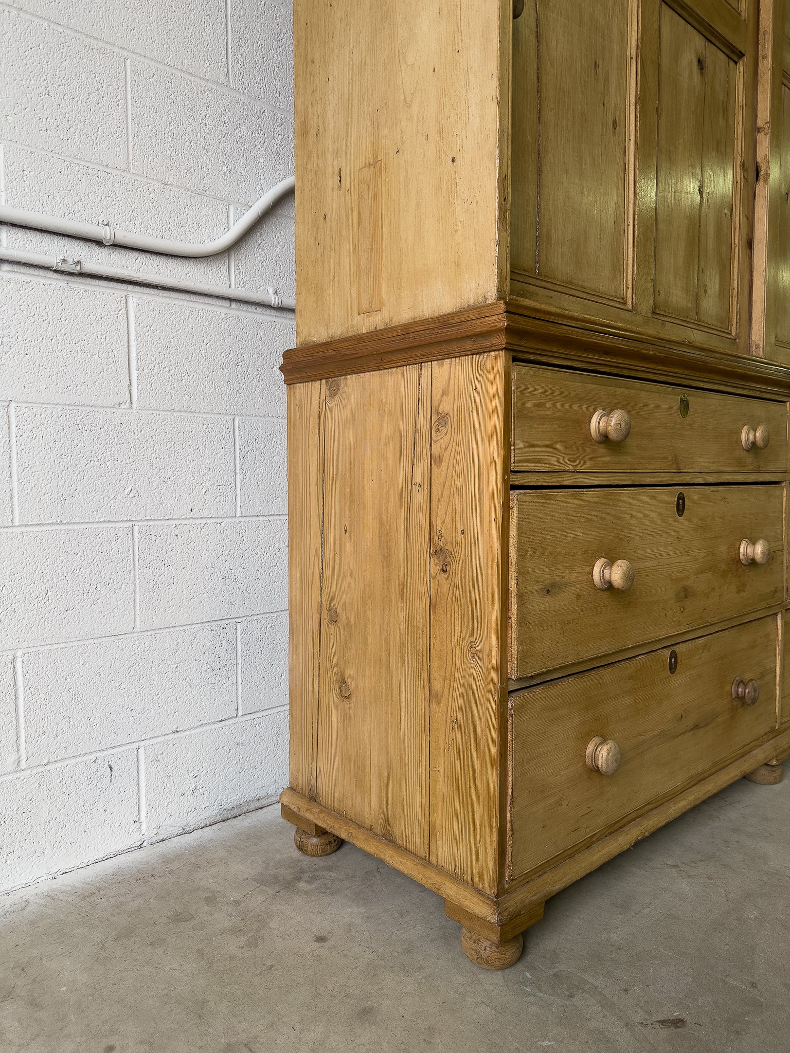 Large antique pine housekeepers cupboard with sliding doors