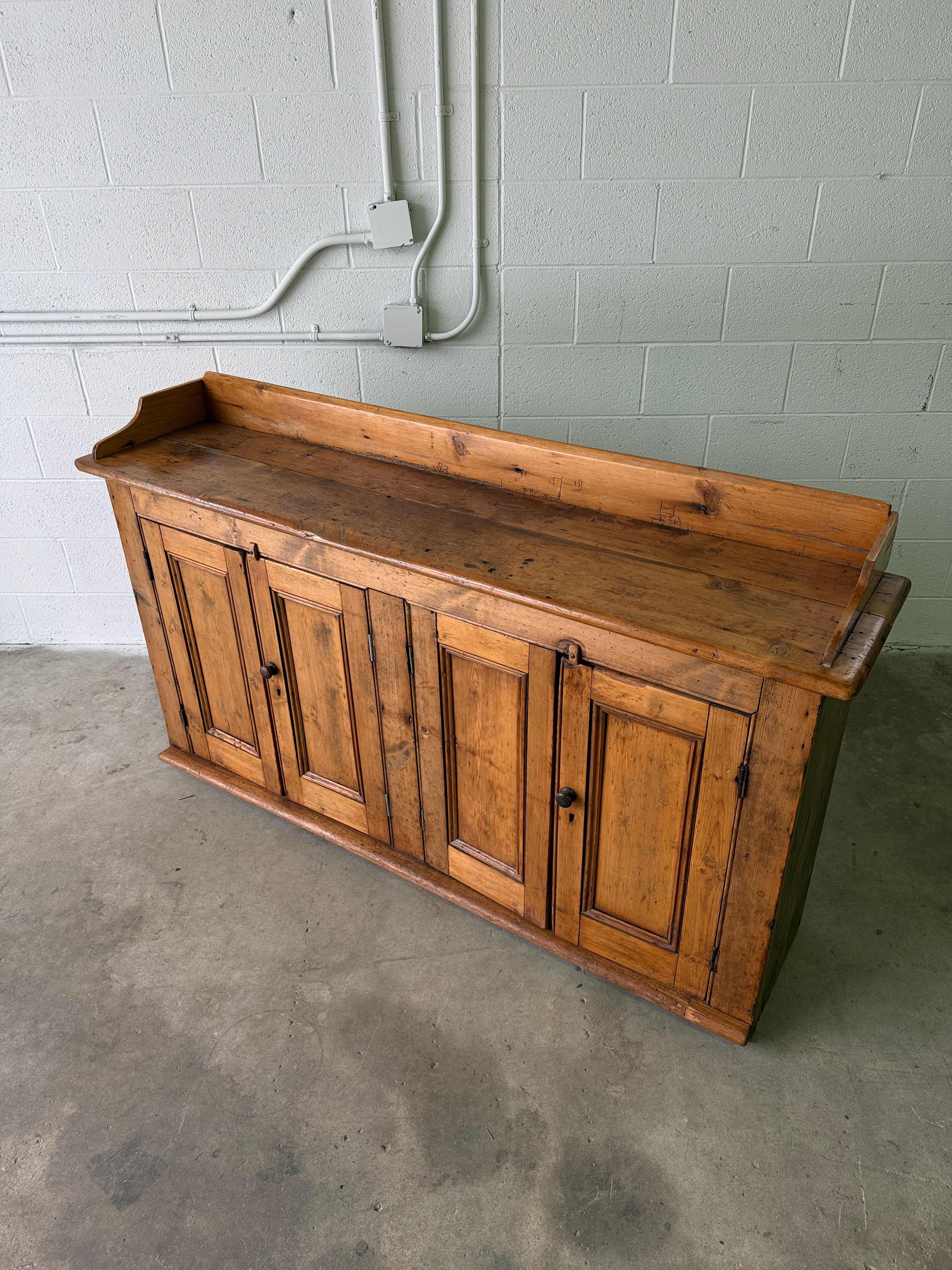 Antique pine sideboard with gallery back