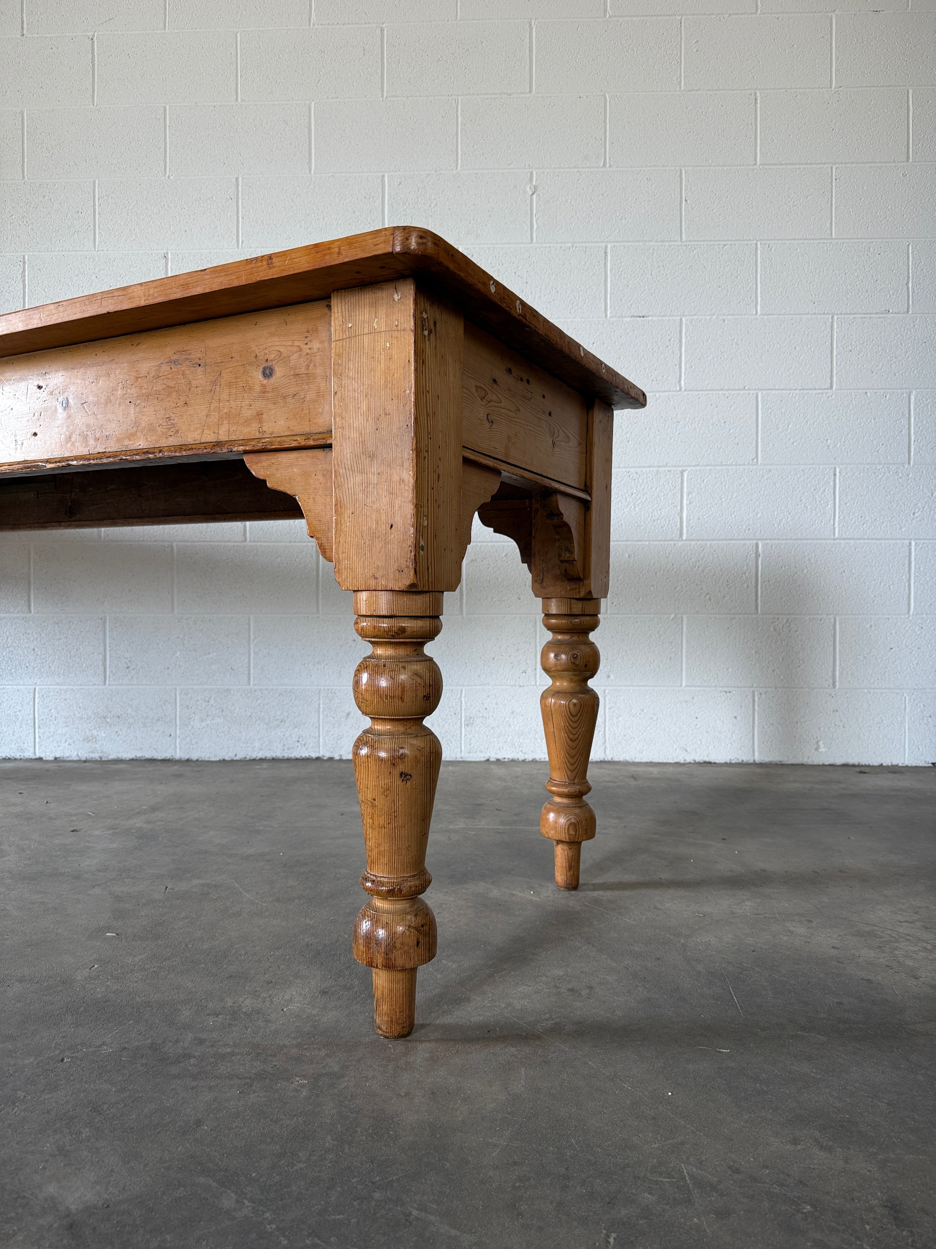 8’ antique pine dining table with detailed apron