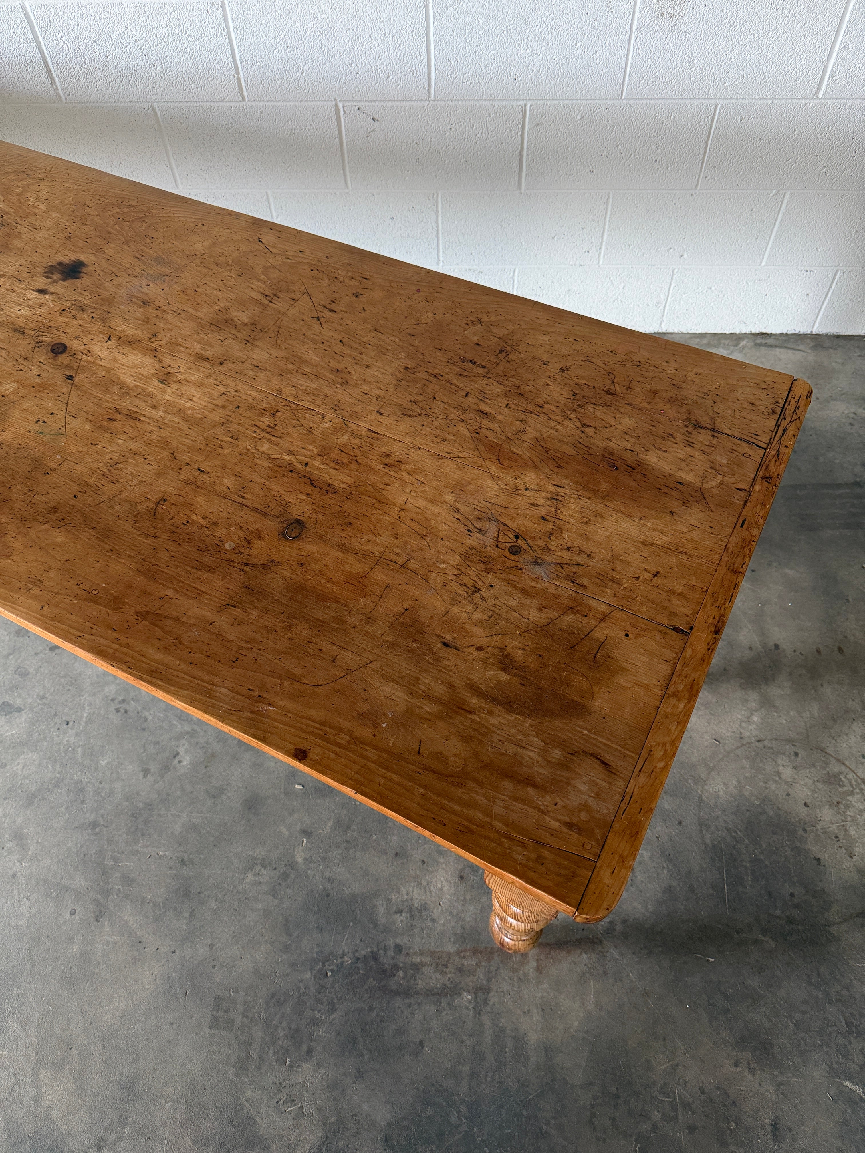 8’ antique pine dining table with detailed apron
