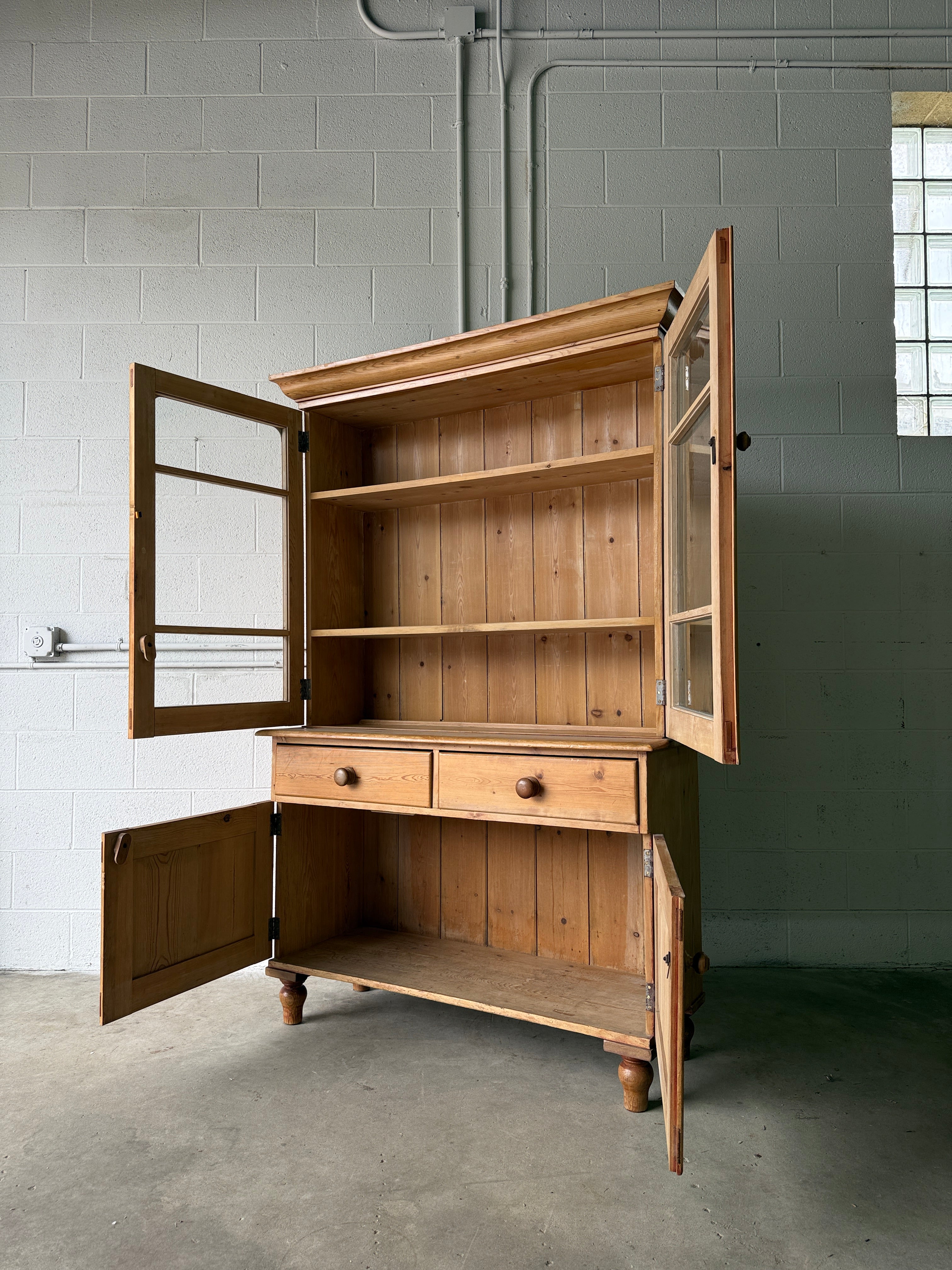 Beautiful antique pine cupboard with original glass