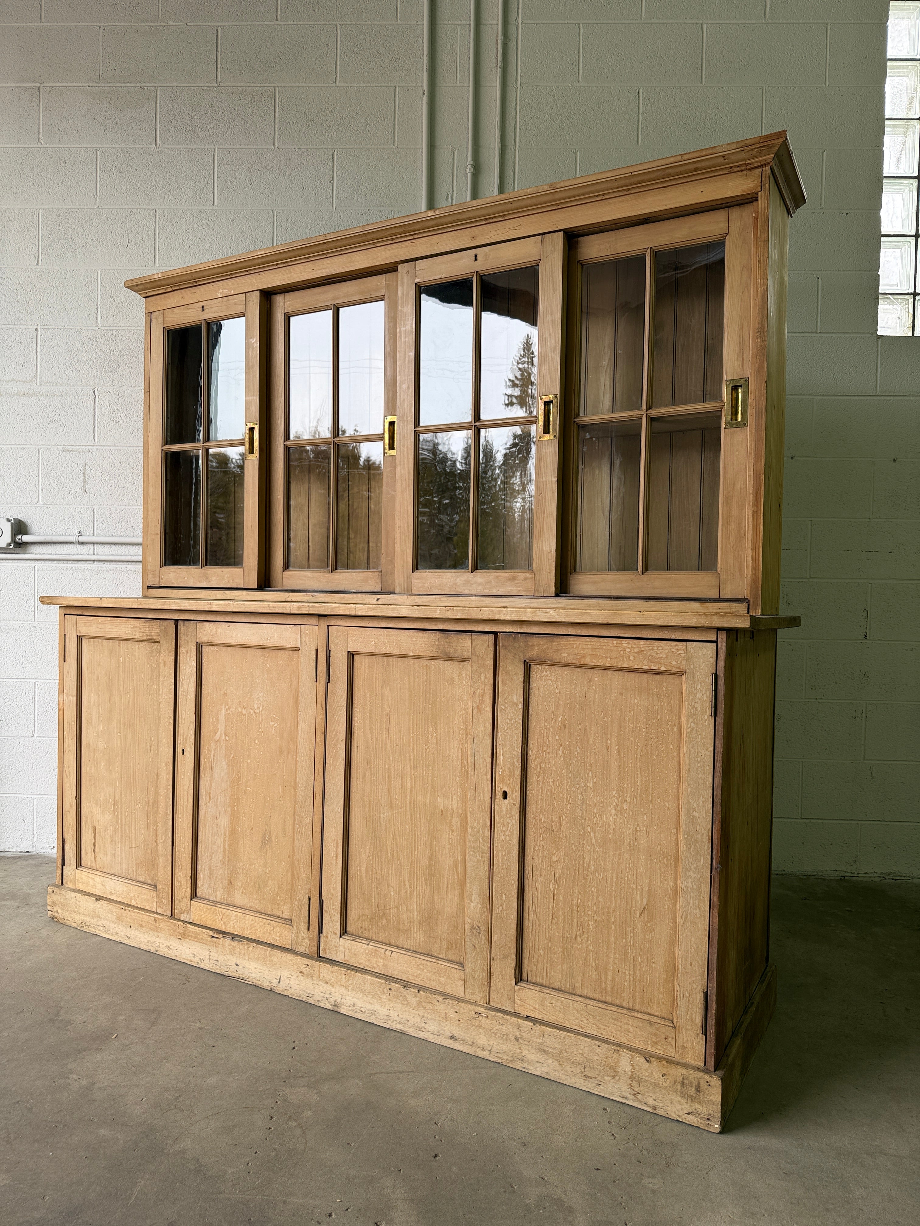 Victorian pine cupboard with glass sliding doors