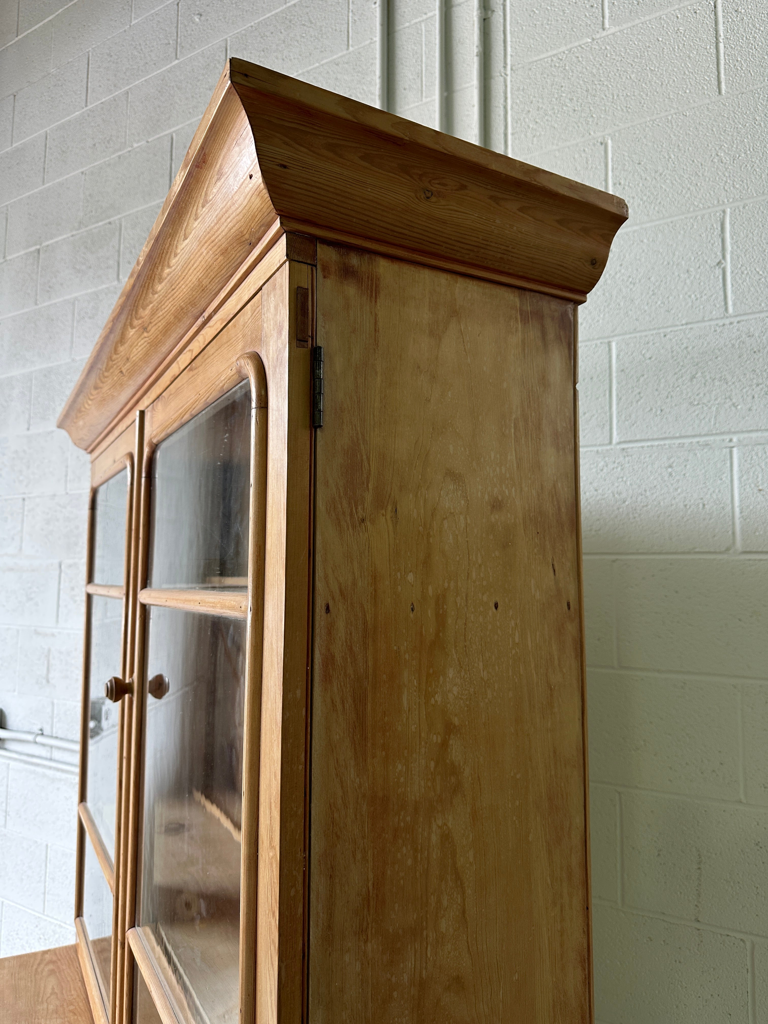 Beautiful antique pine cupboard with original glass