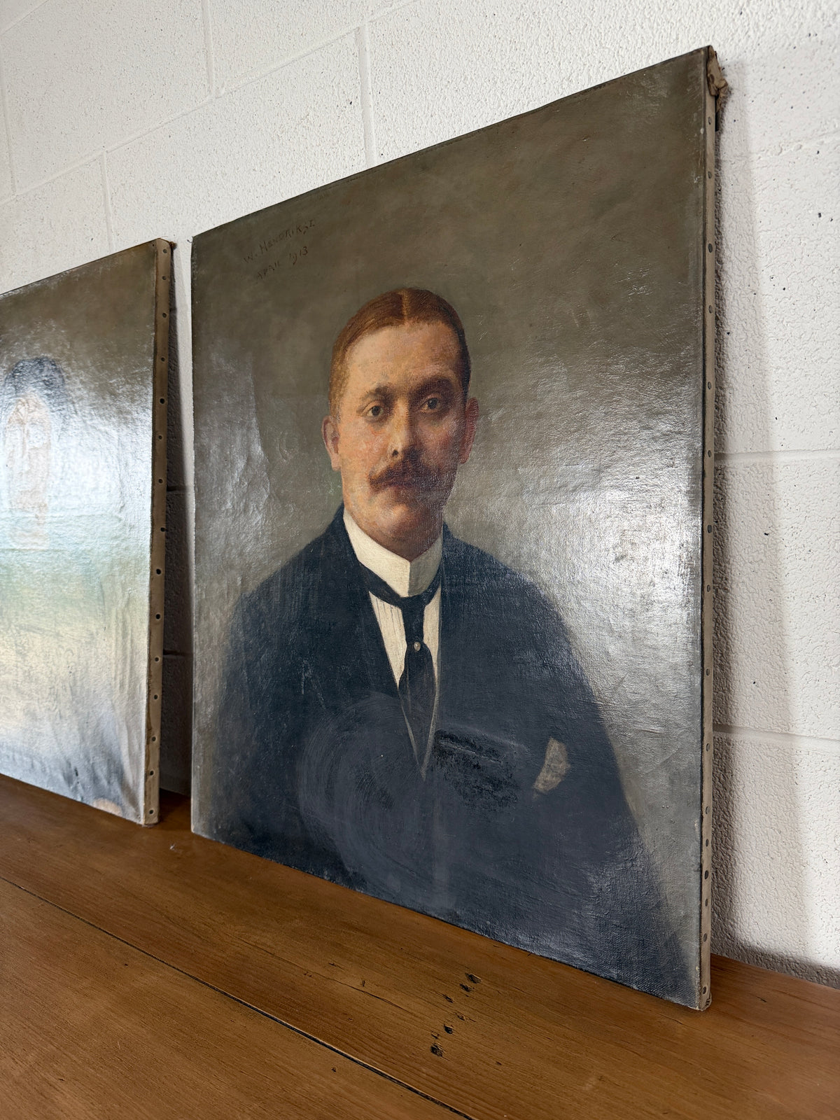 Pair of antique oil portraits