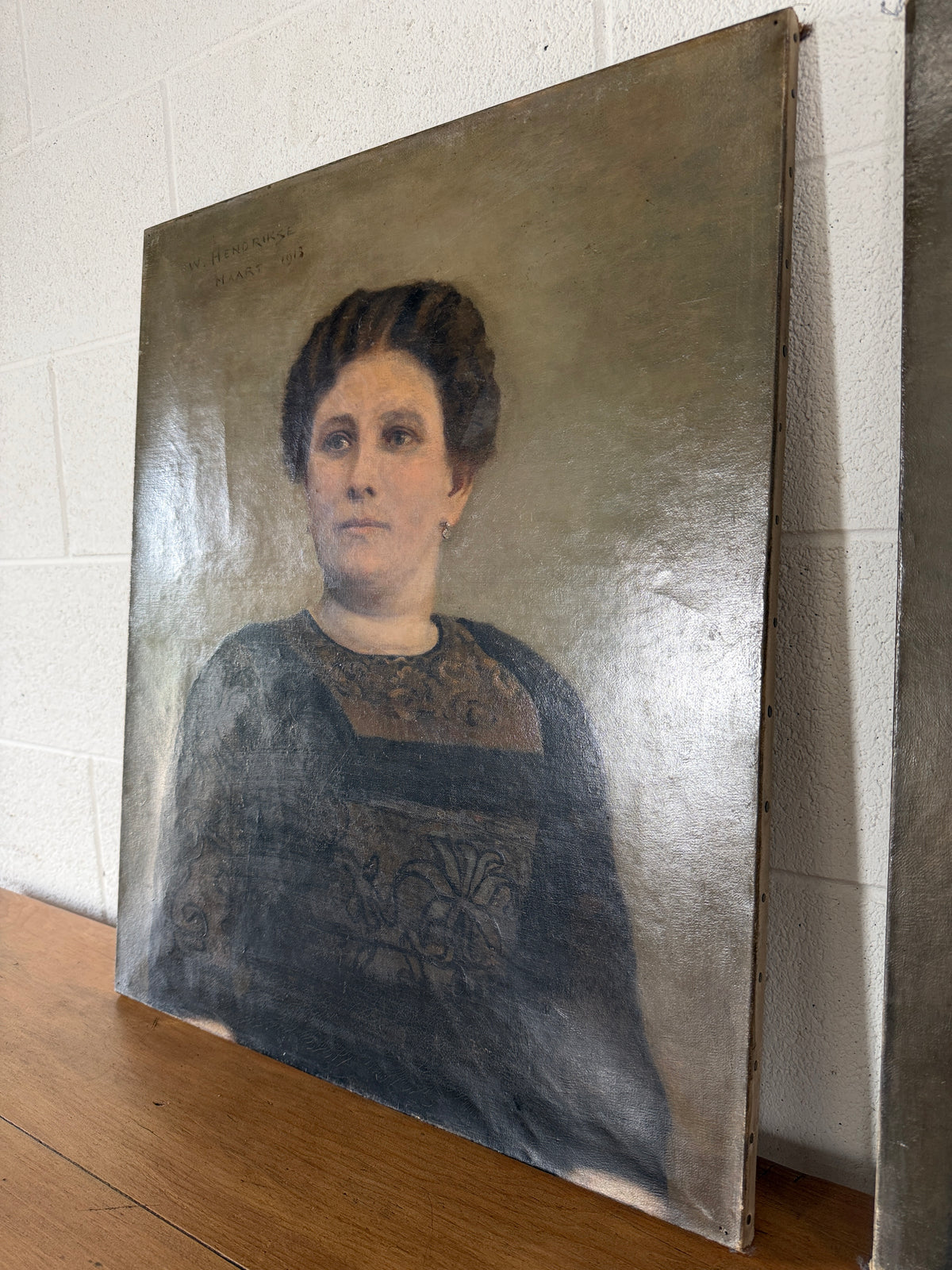 Pair of antique oil portraits