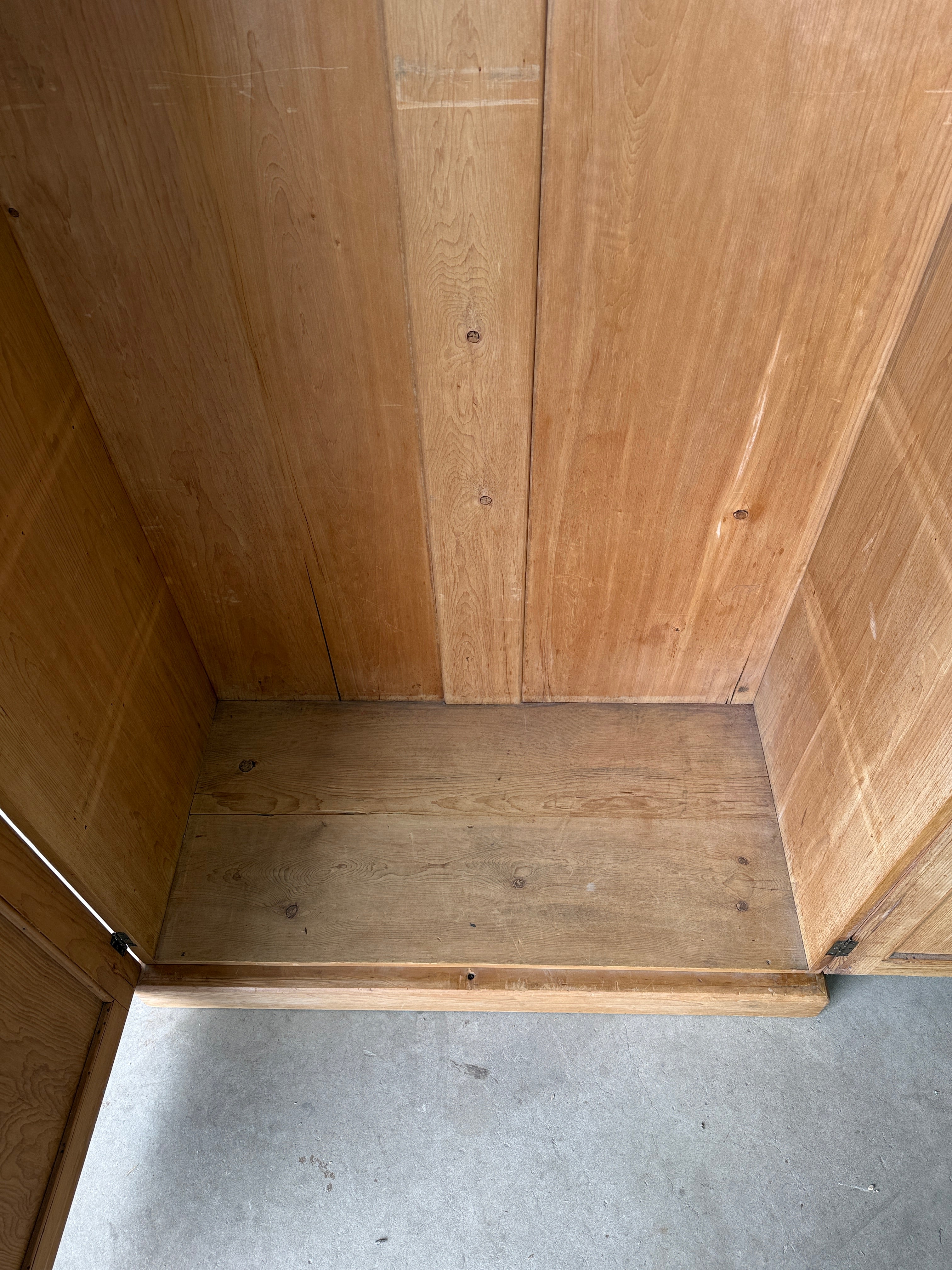 Modest antique English pine wardrobe