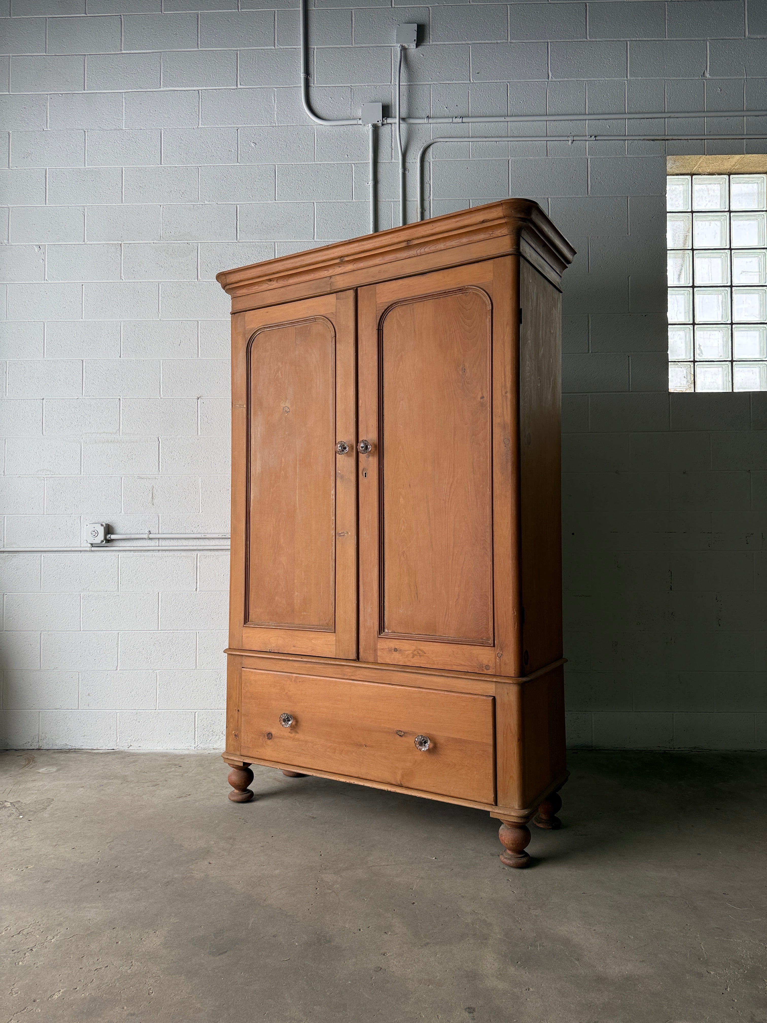 Substantial antique pine double wardrobe with painted interior
