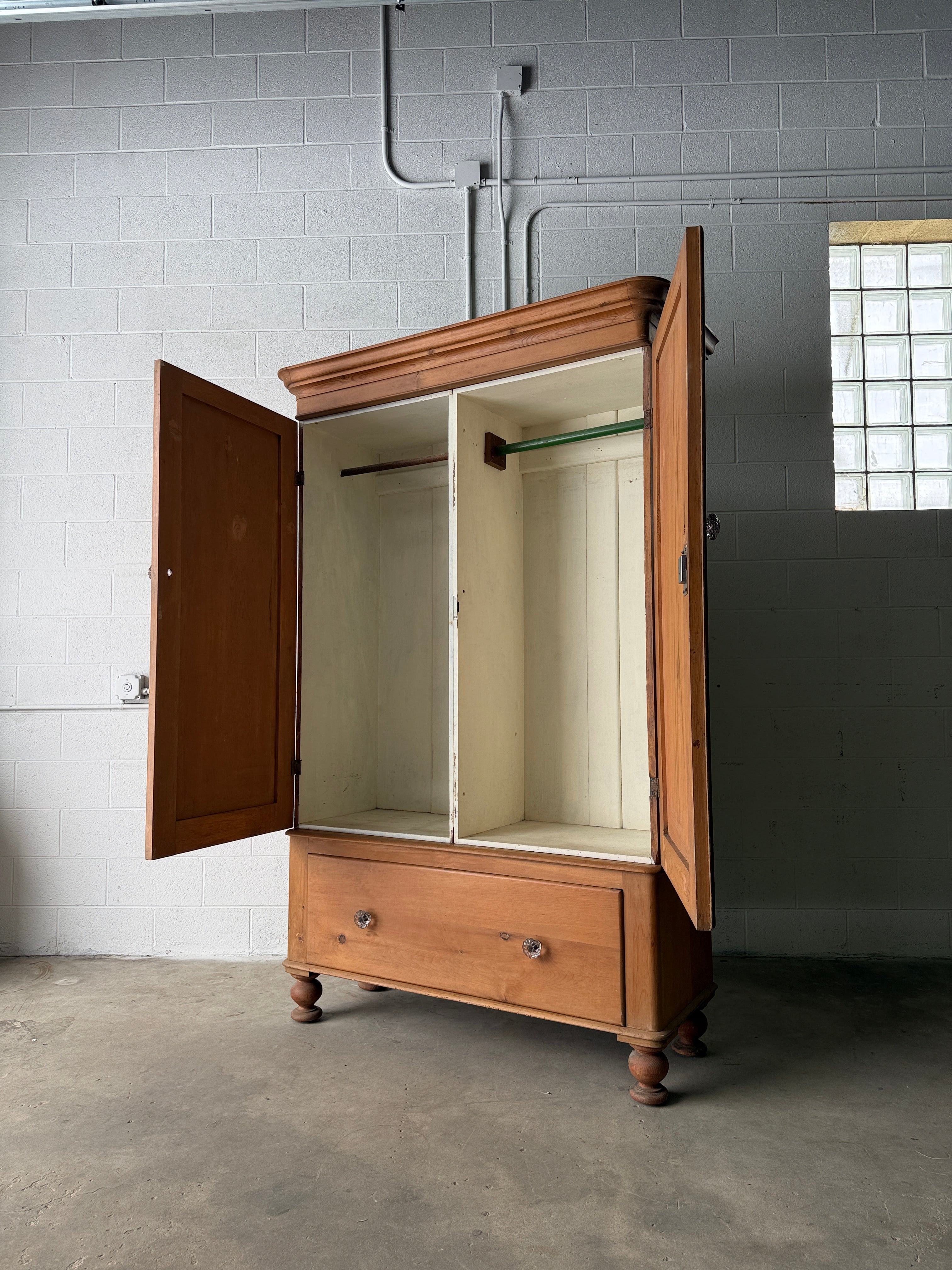 Substantial antique pine double wardrobe with painted interior