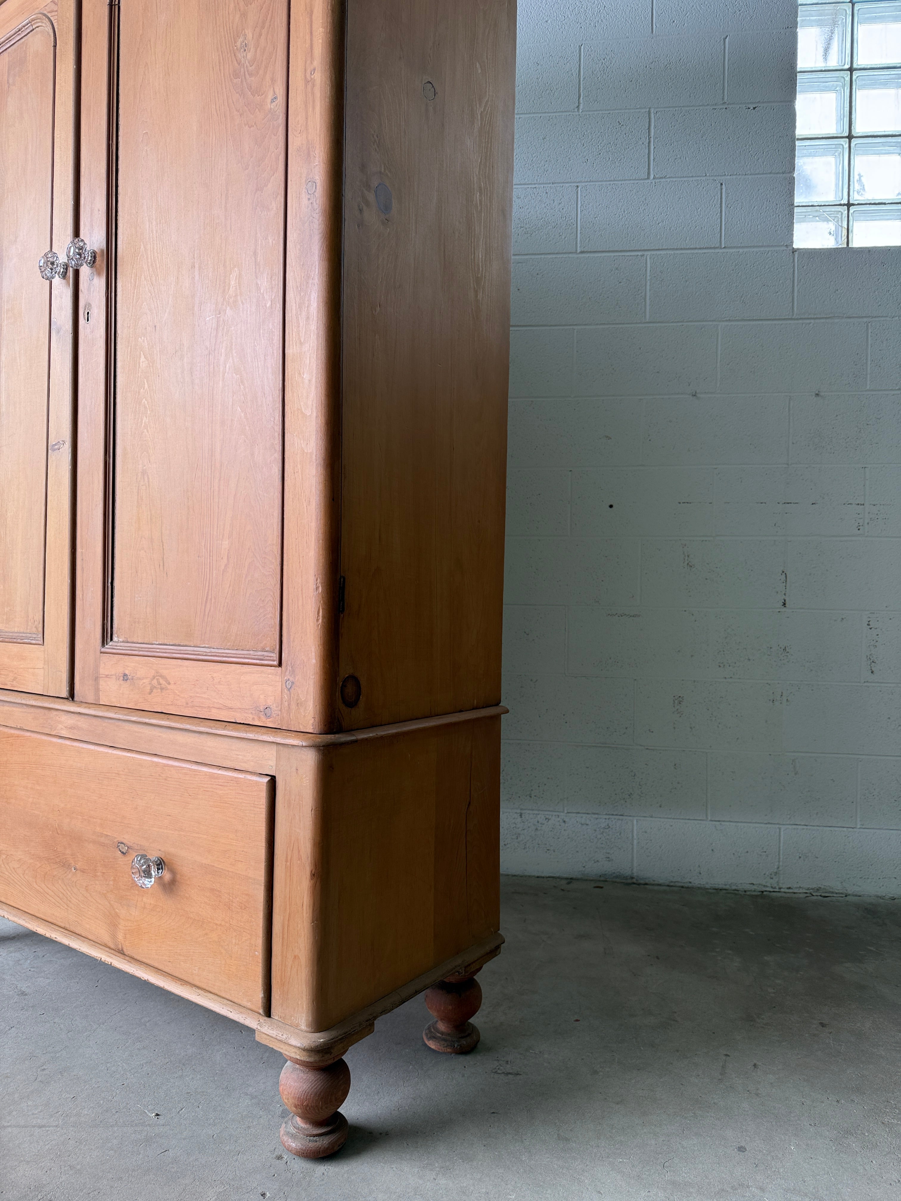 Substantial antique pine double wardrobe with painted interior