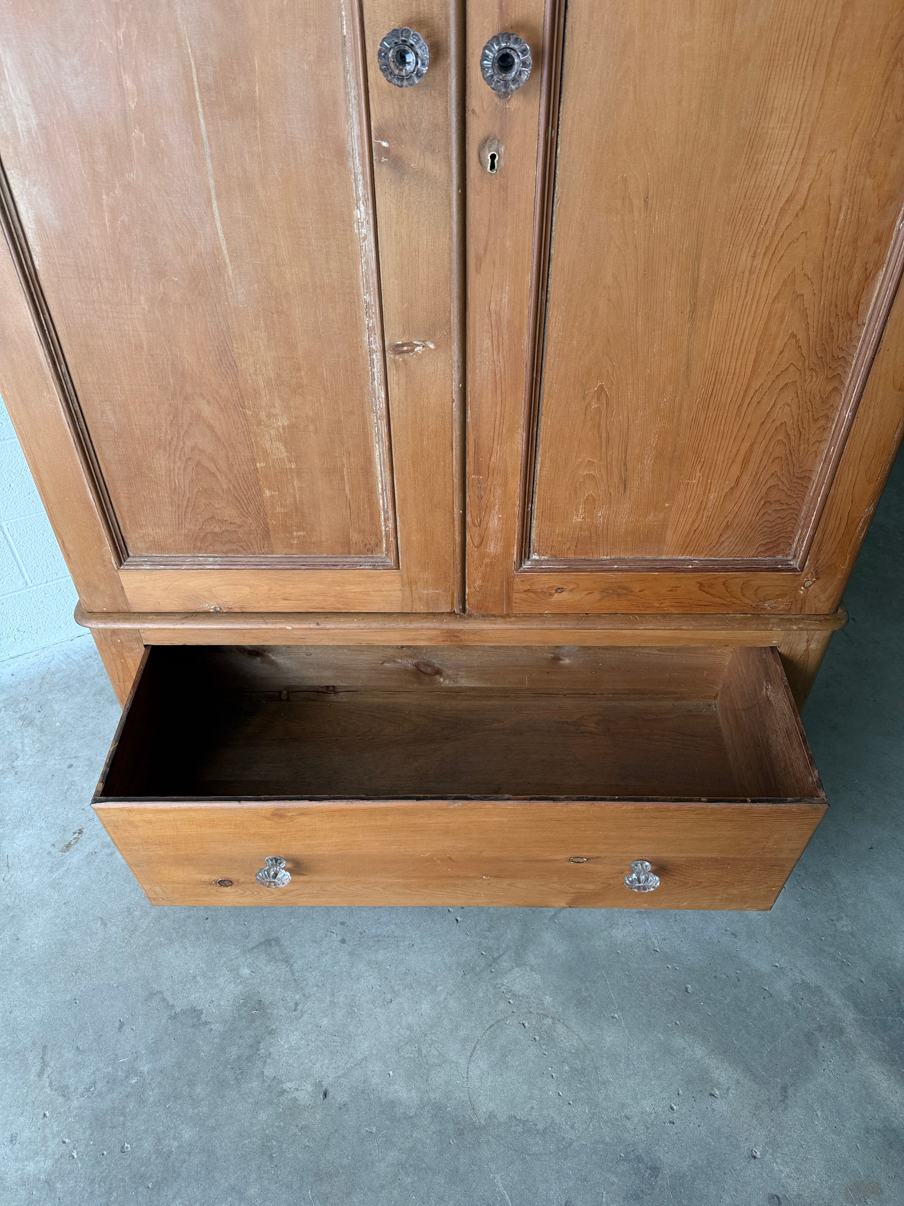 Substantial antique pine double wardrobe with painted interior