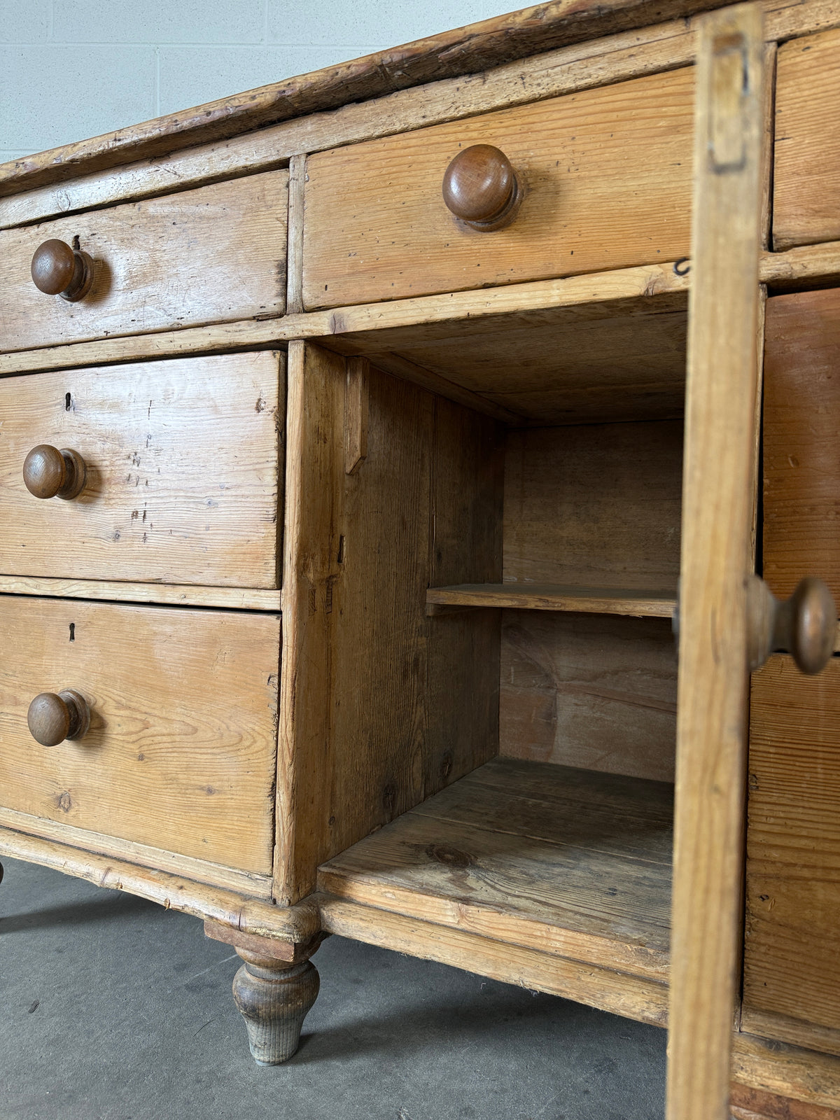 Antique pine sideboard with 7 drawers