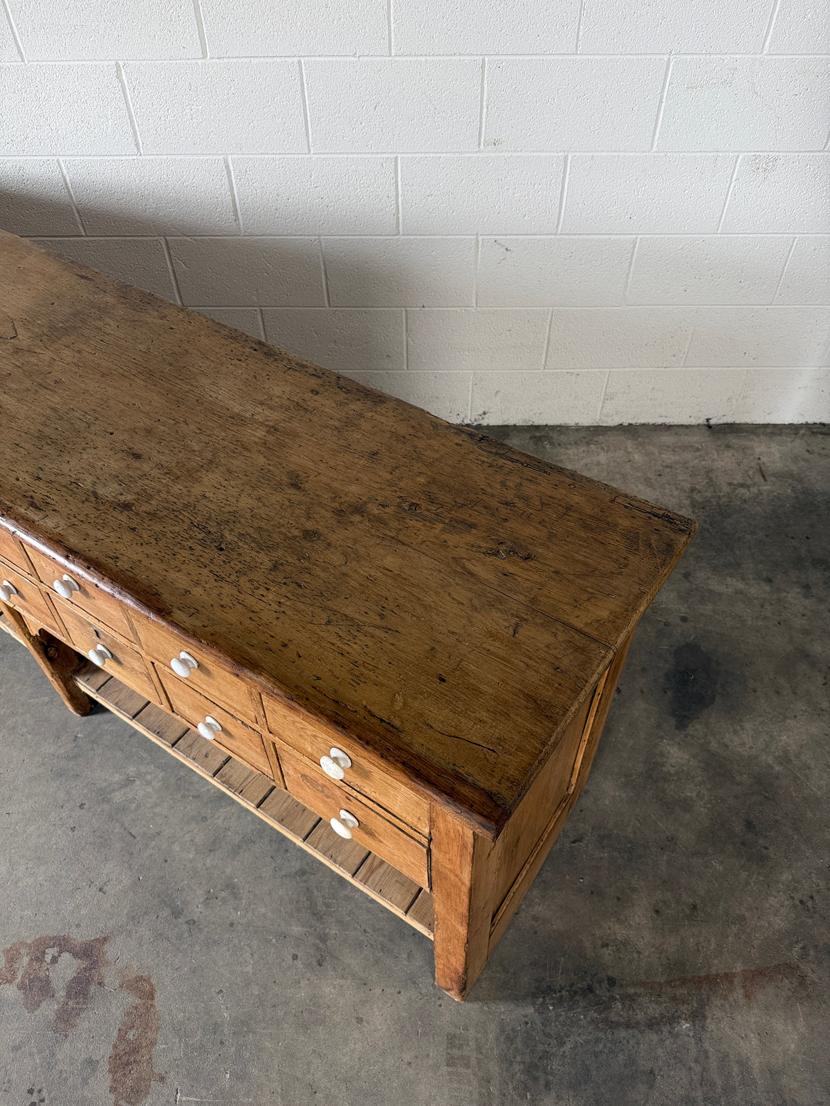 English antique pine shop counter with 15 drawers