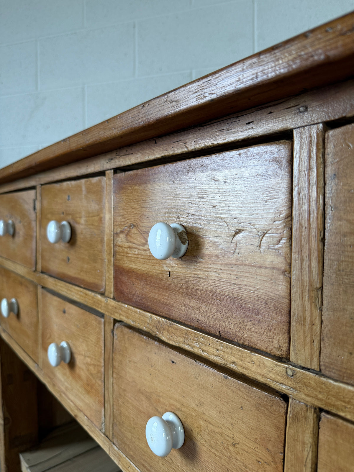 English antique pine shop counter with 15 drawers