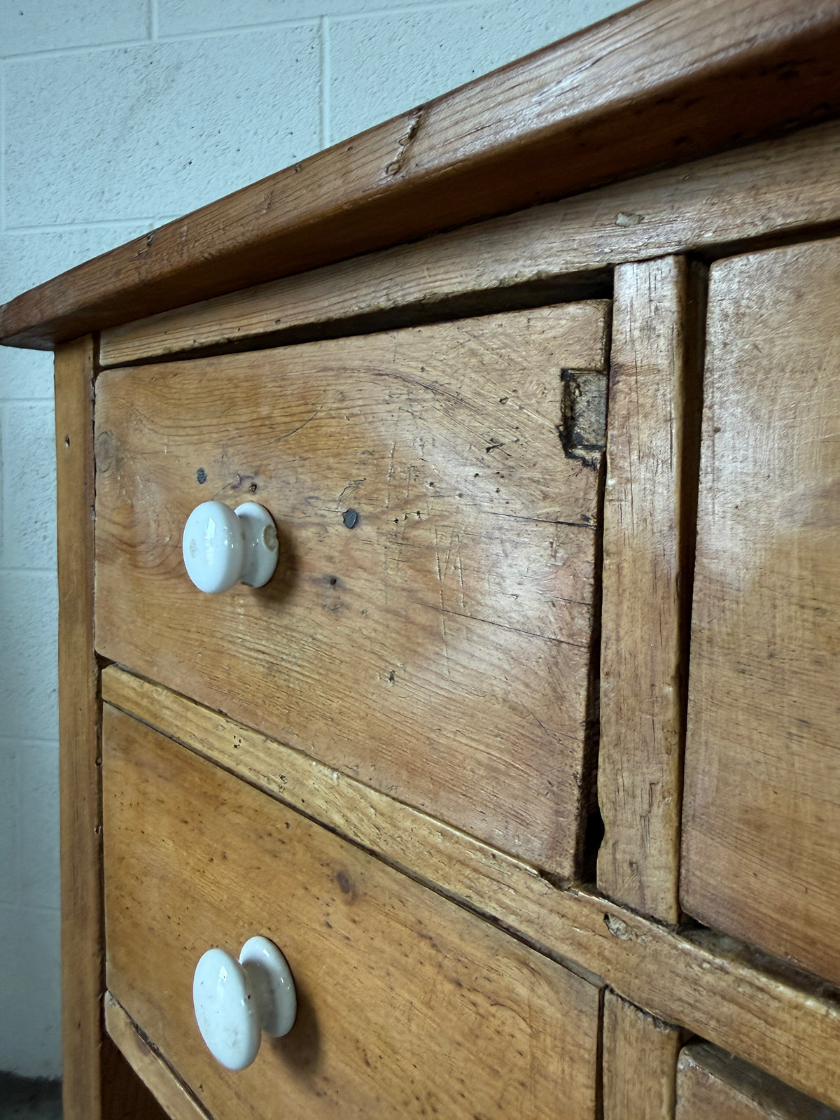 English antique pine shop counter with 15 drawers