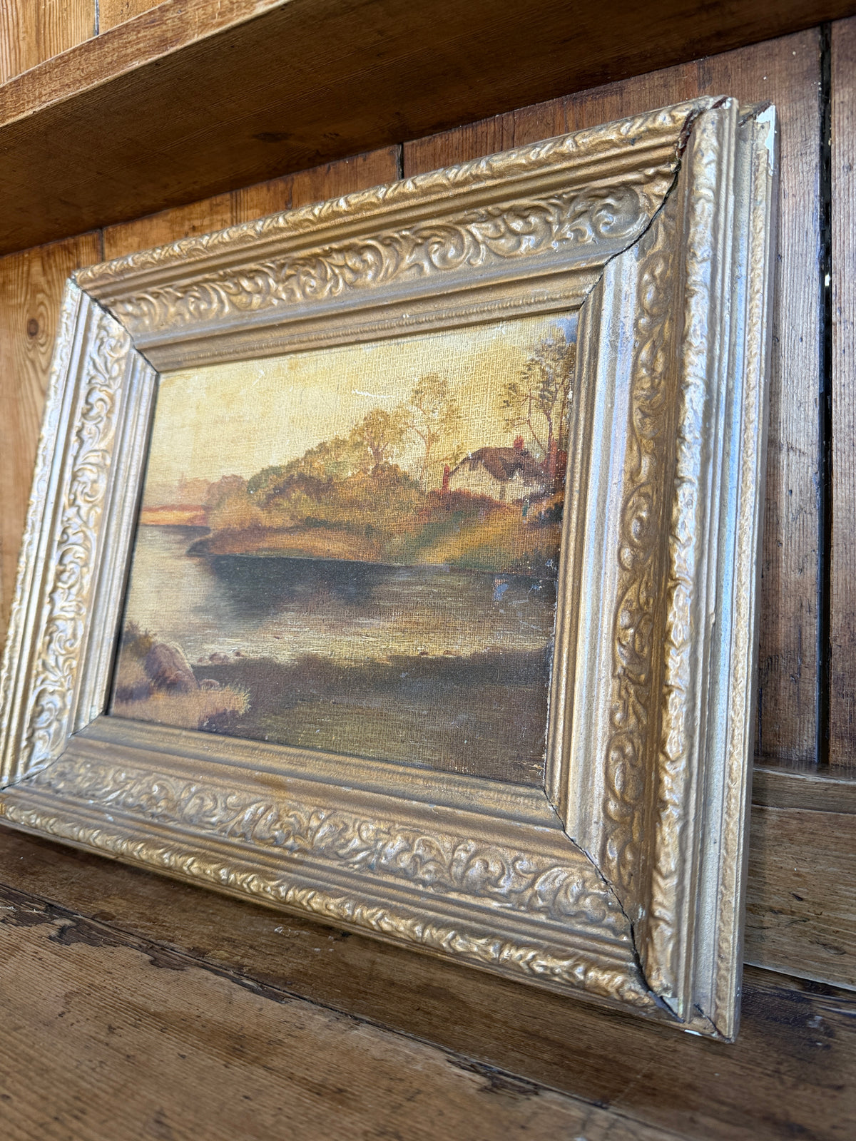 Antique landscape in wooden frame