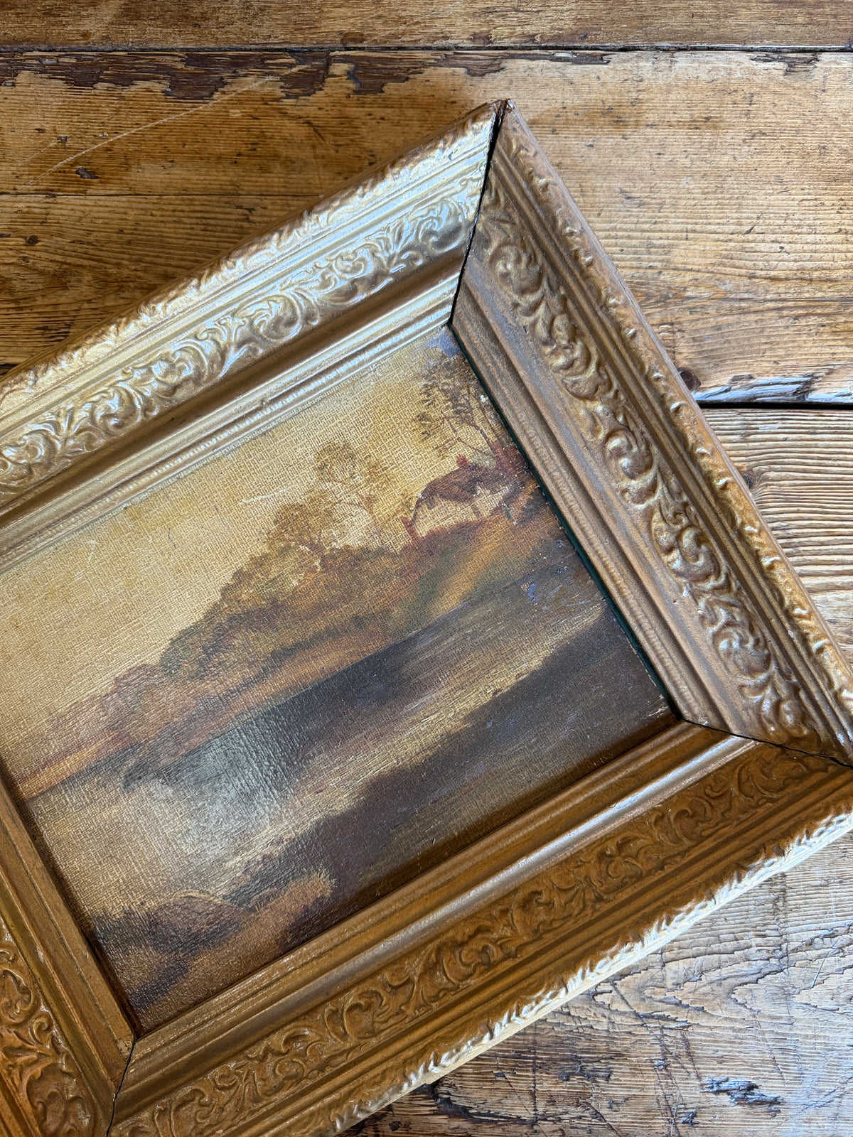 Antique landscape in wooden frame