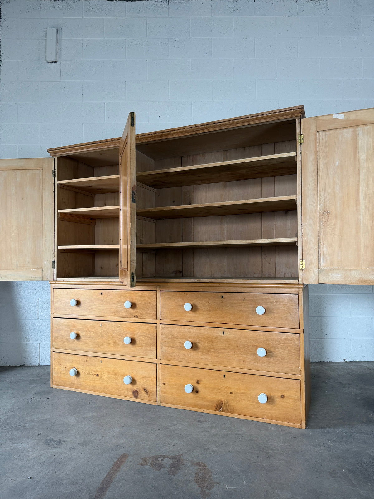 Housekeepers cupboard with six base drawers