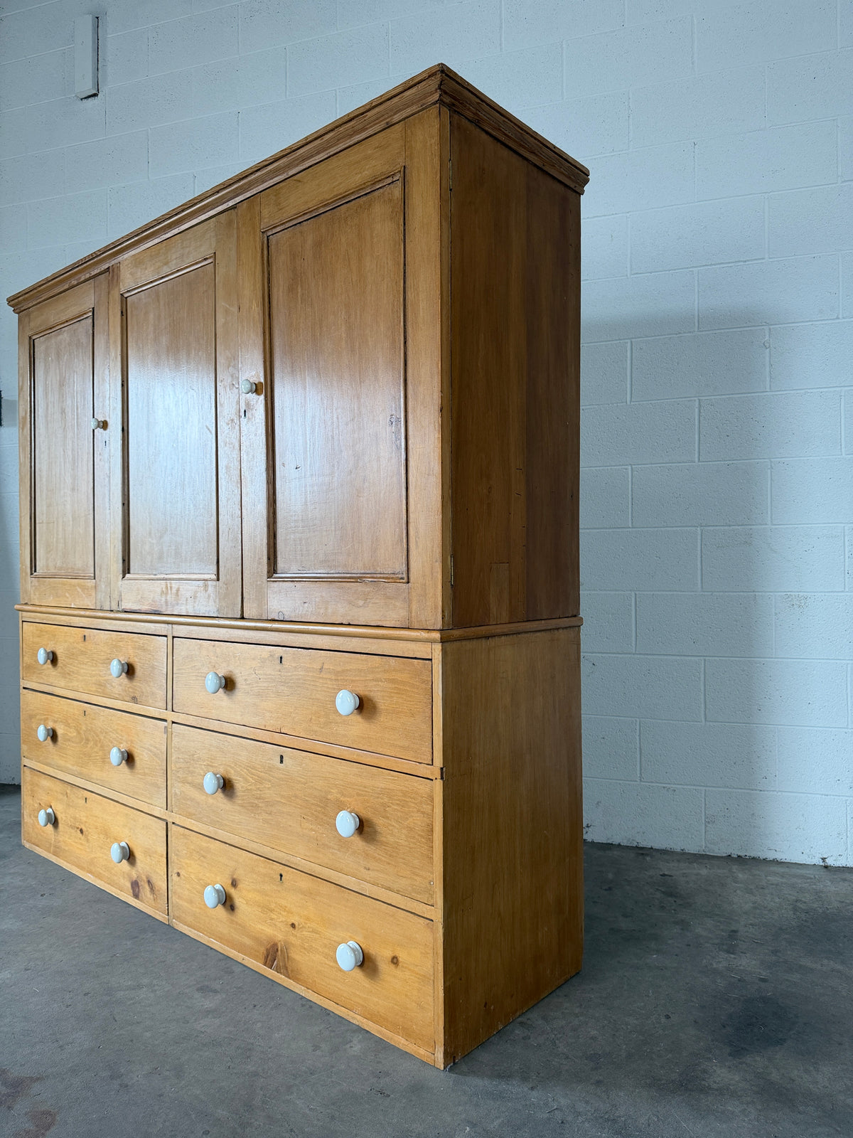 Housekeepers cupboard with six base drawers